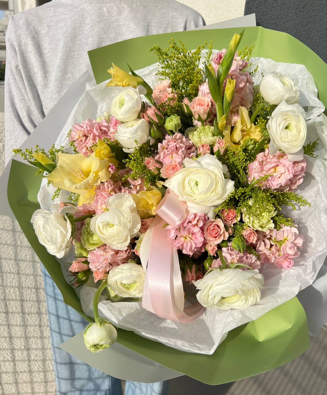 Spring Call - Spring Call is a delicate, airy bouquet infused with the warmth of early spring days. Soft cream and pastel pink hues, elegant ranunculus, fragrant matthiola, graceful gladiolus, and exquisite spray roses create a sense of freshness and nature’s awakening.  This bouquet feels like a gentle call for spring, filling the space with lightness, romance, and refined elegance. A perfect choice for those who want to share a touch of spring sunshine and joy! 
