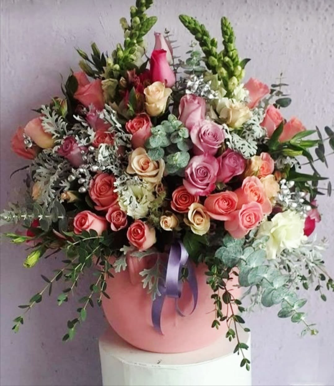 Many Small Roses by Pretty in Petals Many Small Roses by Pretty in Petals - A lavish bouquet bursting with the timeless beauty of numerous roses. This arrangement is perfect for expressing deep affection, celebrating special occasions, or simply adding a touch of romance to any space. The arrangement features a stunning array of roses in various colors, creating a breathtaking display of elegance and charm.