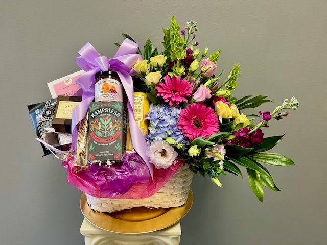 Sugar and Spice Sugar and Spice - Can't decide what to send? Are you thinking maybe flowers or maybe a gourmet basket. With Sugar and Spice you don't need to choose, you can send both! A gourmet basket and a stunning floral arrangement are artistically designed into one basket. This choice is appropriate for all occasions!