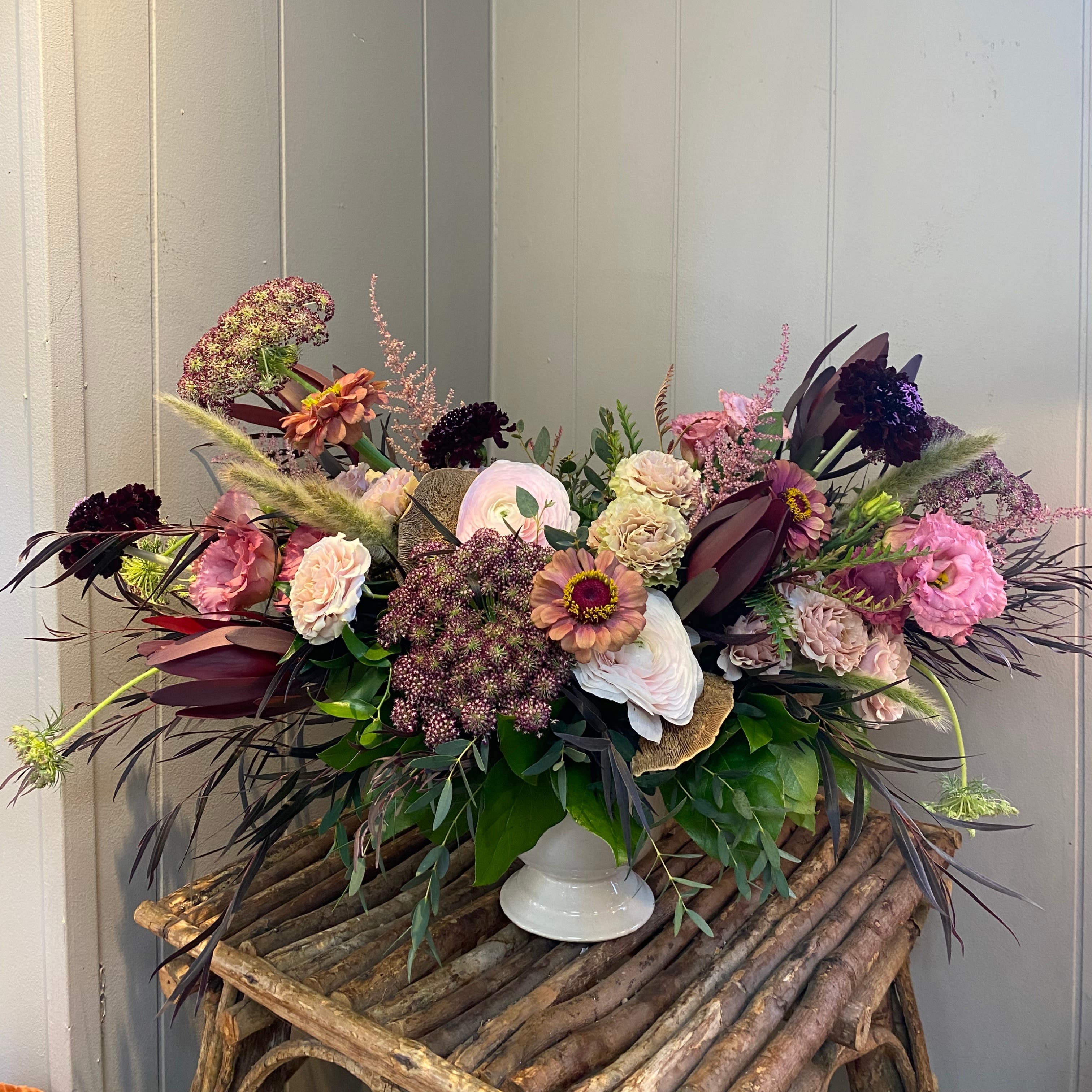 Into The Woods Into The Woods - Whimsical and organic, this arrangement will make you feel like you're going Into The Woods