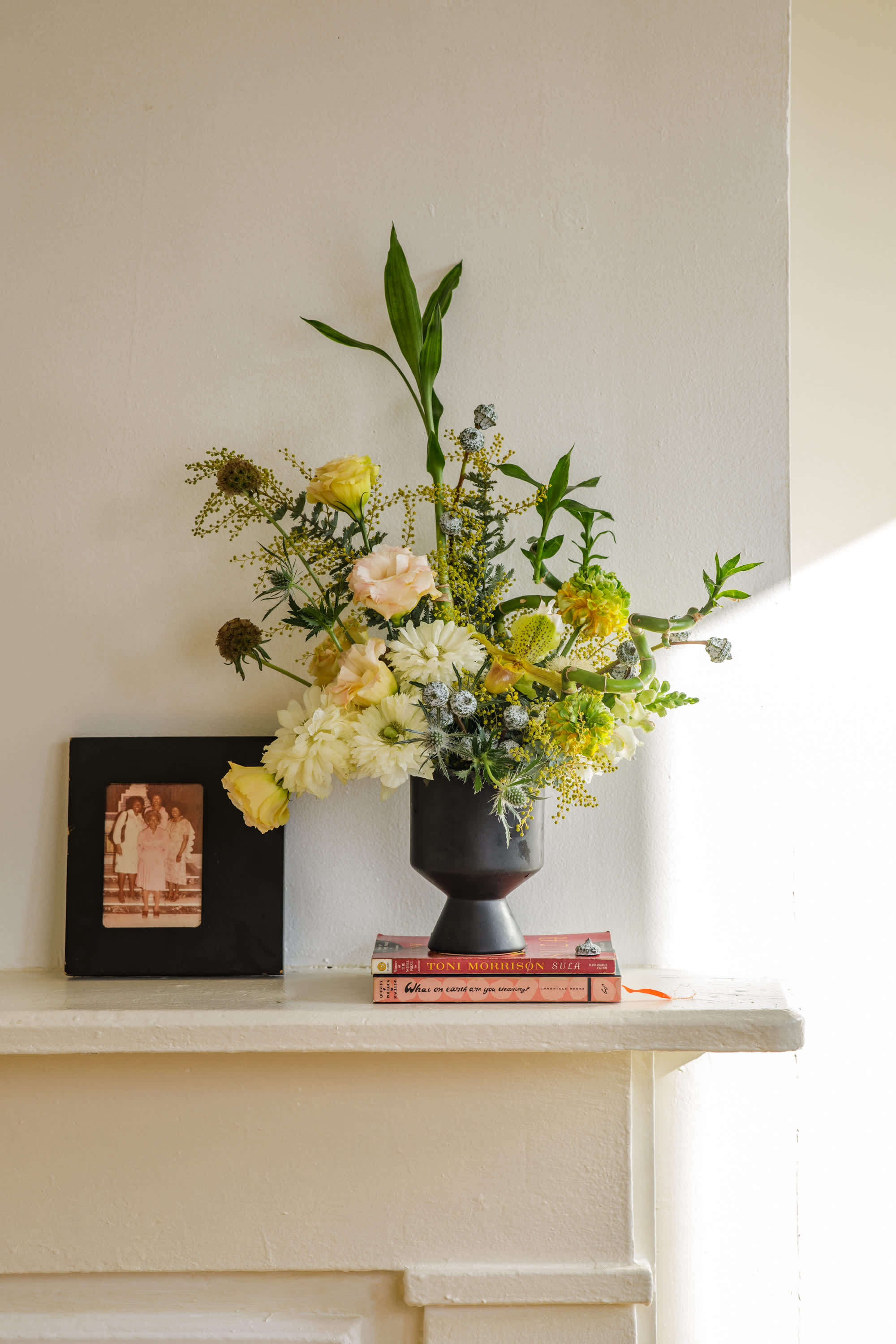 Bamboo &amp; Blooms Collection: The Saratoga  - &quot;The Saratoga&quot;  is our large-sized modern arrangement created in a ceramic vase. By using Lucky Bamboo, Lotus Bamboo and pairing with complimenting blooms this design is sure to be a sculpturally engaging arrangement for any space. Once the flowers have gone through it's life cycle enjoy the Lucky &amp; Lotus Bamboo in a beautiful vessel.   Each of our custom designs is created using fresh curated seasonal blooms. Designers will choose from a unique array of flowers and Lucky Bamboo to create an arrangement tailored for you. Just as no two people are alike so are our arrangments. For special floral requests please place order 4 days prior to the desired delivery date.    **Please note that Brooklyn Blooms move with the seasons, vessels, blooms, and foliage will vary from what you see in the photo. However, it will have the same beauty, uniqueness, and funky style. Please let us know in the florist notes if you have any color preferences, or special requests or love what's in the photo, otherwise, the Bloomies will make a tasteful decision for you! **  ***ALL SPECIAL REQUESTS MUST BE SPECIFIED IN THE FLORIST NOTES SO THAT OUR BLOOMIES ARE AWARE AND CAN DELIVER THE BEST SERVICE. COMMUNICATION IS KEY!!****  Upgrade Notes: Please note that with each upgrade the Bloomies will choose a mix of blooms, premium foliages, and filler to enhance your arrangement for the best presentation!  