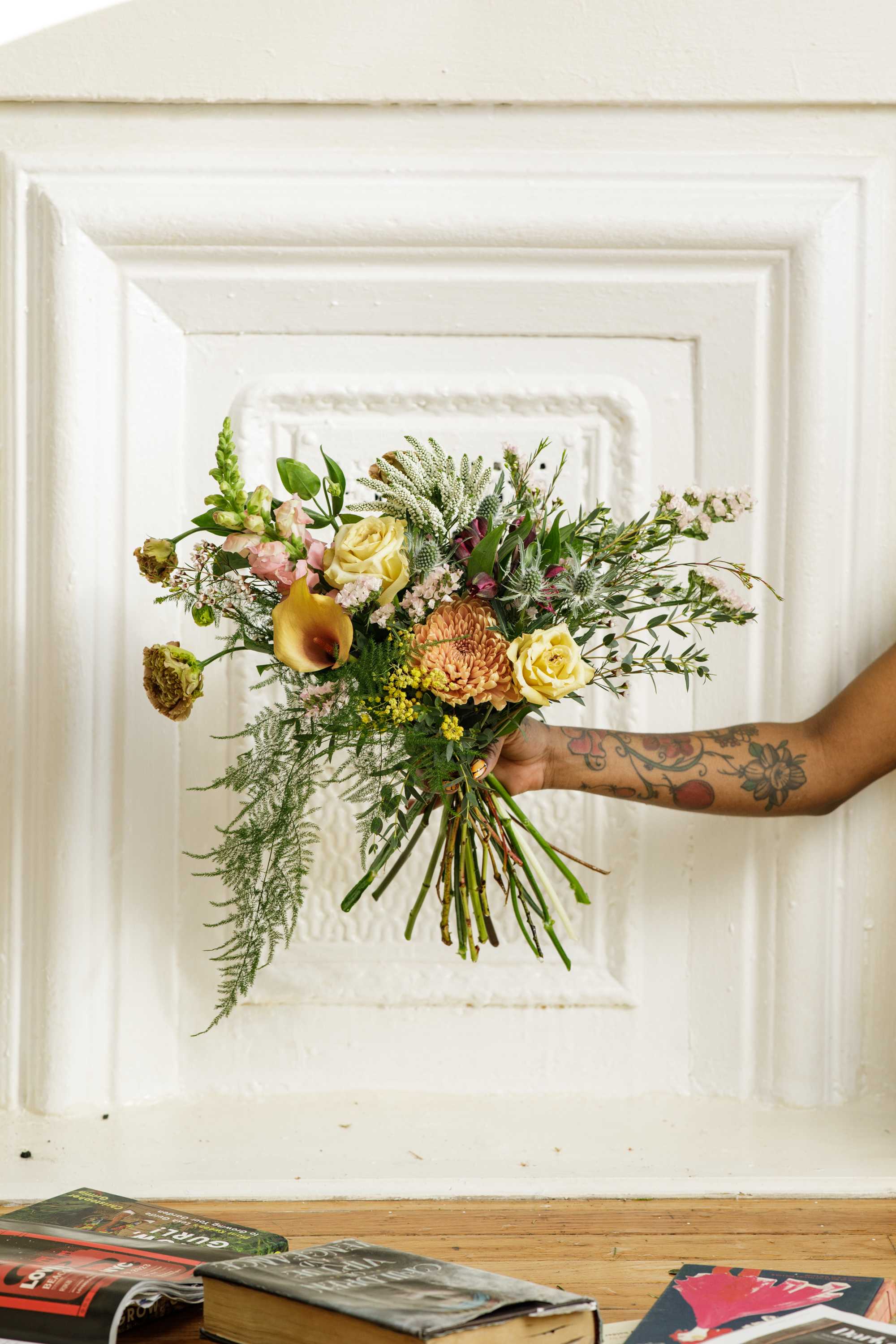 The Sweet &amp; Petite Bouquet  - Designer's Choice  - Gift them this fresh hand-tied bouquet, created using a mix of fragrant, colorful, and unique blooms put together by our floral artists.   ***Please note that Brooklyn Blooms moves with the seasons. What you see pictured represents our style and the general size of the Sweet N' Petite bouquet.  Although it not be the same as the photo it will have the same beauty, uniqueness, and vibe. Please let us know in the florist notes if you have any color preferences, special requests, or love what's in the photo, otherwise, the Bloomies will make a tasteful decision for you! **  ***ALL SPECIAL REQUESTS MUST BE SPECIFIED IN THE FLORIST NOTES SO THAT OUR DESIGNERS ARE AWARE AND CAN DELIVER THE BEST SERVICE. COMMUNICATION IS KEY!!****  Upgrade Notes: Please note that with each upgrade the Bloomies will choose a mix of blooms, premium foliages, and filler to enhance your arrangement for the best presentation!  
