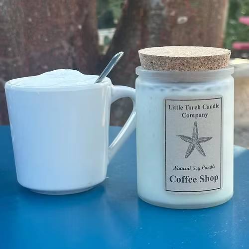 Coffee Shop Coffee Shop - Transfer your space into a Coffee Shop with this wonderful candle that starts out with the strong comfort of fresh ground coffee beans followed by a touch of the sweetness of cream and sugar. This is a perfect candle for all coffee lovers!