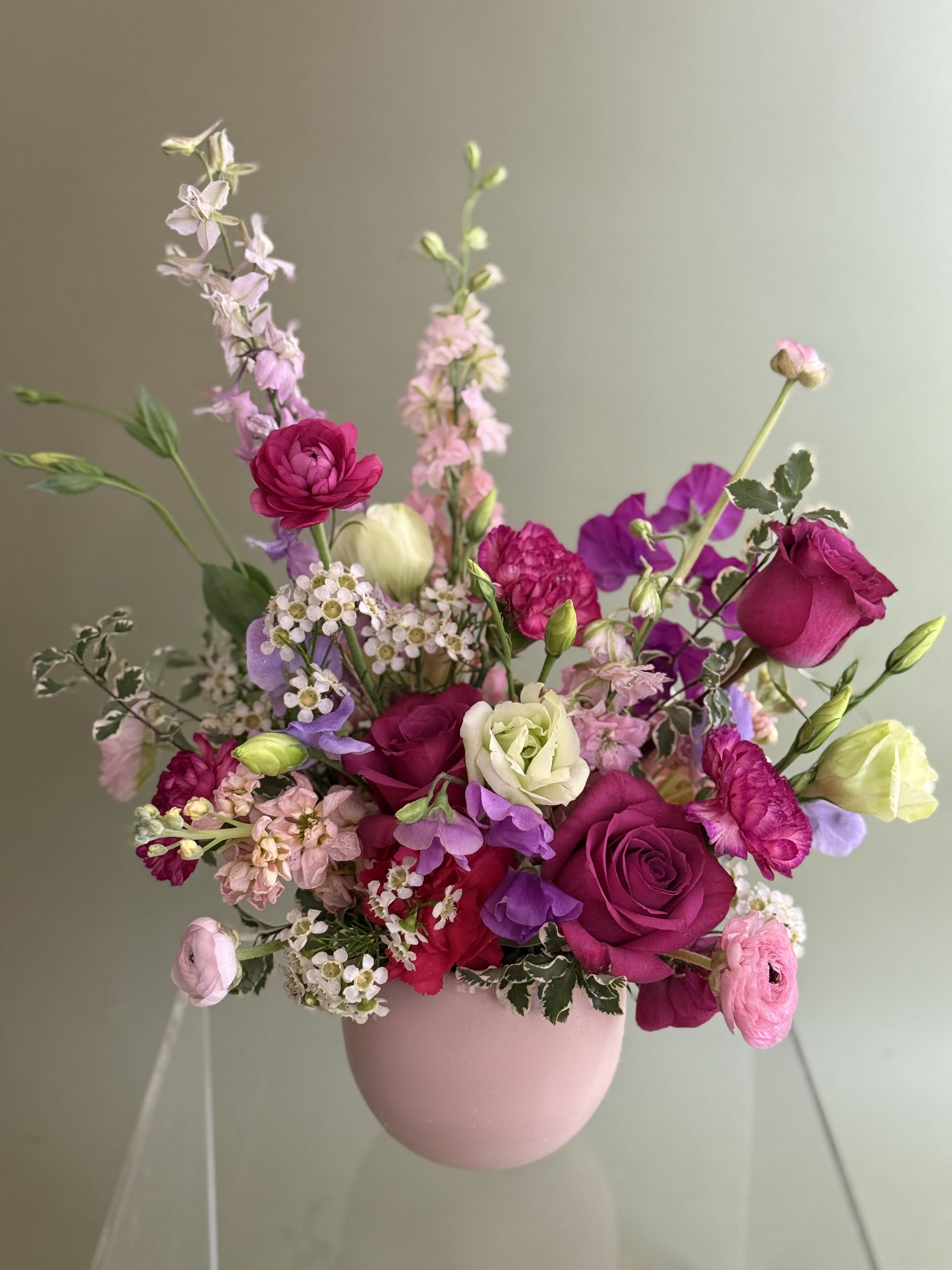 Designer’s Choice Favorite Arrangement  - Designer's Choice by Barbara - Leave it to the artist. With our Designer's Choice service, Barbara creates a unique floral arrangement using the season's freshest , most beautiful blooms. Guided by her signature style and creative vision, no two designs are ever the same - each is a surprise, crafted just for you. Simply choose the size, and Barbara will take care of the rest. *Photos shown are examples only; your arrangement will be one of a kind.