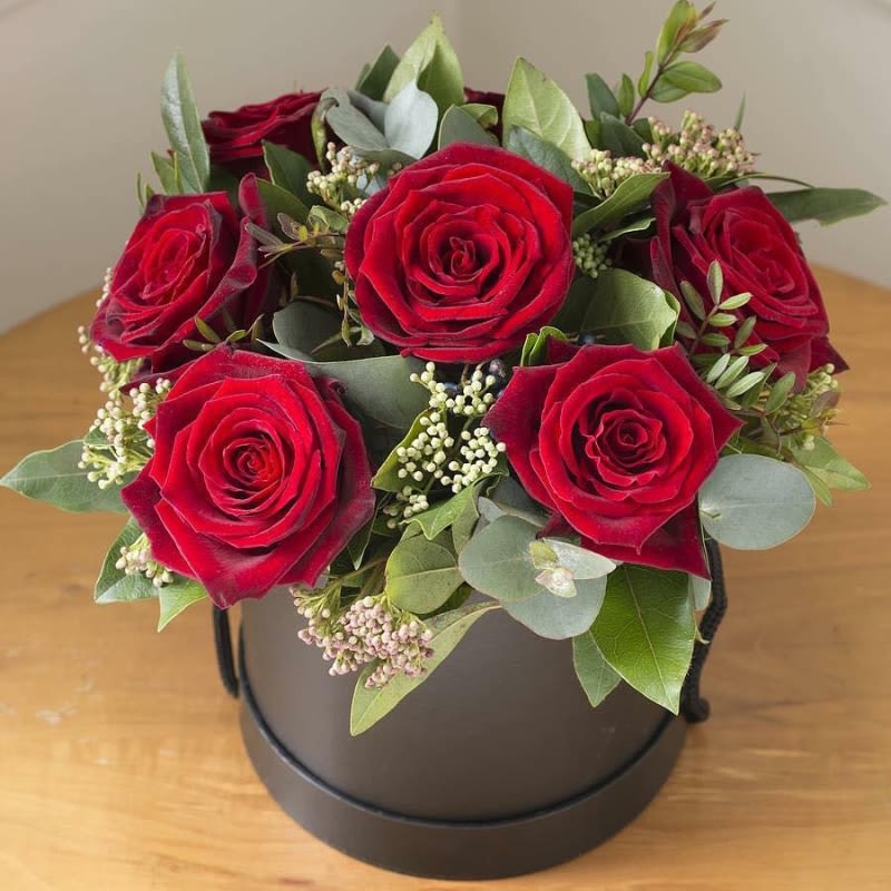 Hat Box Half Dozen - An elegant twist on a dozen roses for your special occasion.  Standard - 6 roses with Eucalyptus and rice flower  Deluxe - 12 roses with Eucalyptus and rice flower Premium - 18 roses with Eucalyptus and rice flower