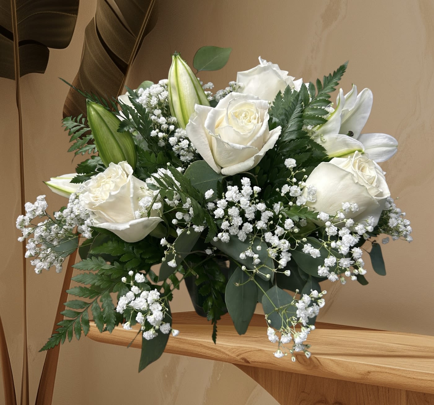 White Harmony White Harmony - A graceful arrangement of white roses, lilies, and baby’s breath, symbolizing purity, peace, and timeless elegance.