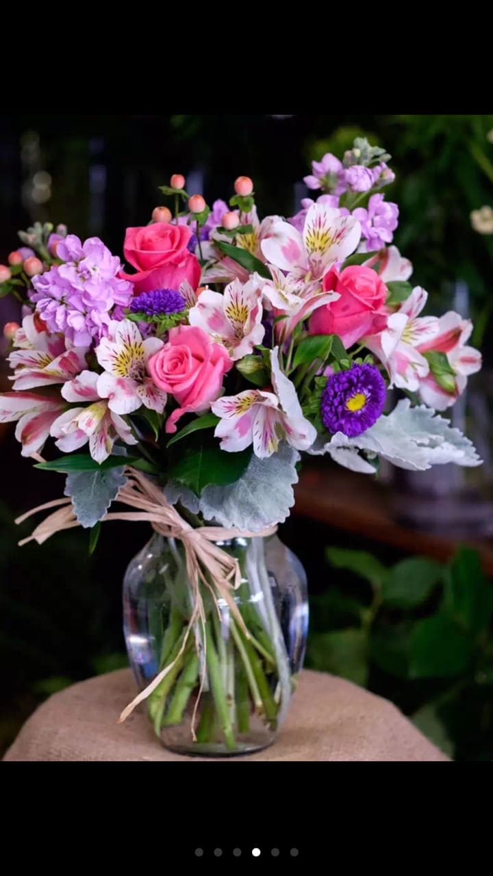 Blushing Blooms - Send a little love with this classically sweet floral arrangement. Designed with the brightest and freshest blooms available. 
