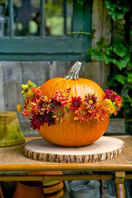 Cracked Pumpkin Cracked Pumpkin - Pumpkin with fall poms .......