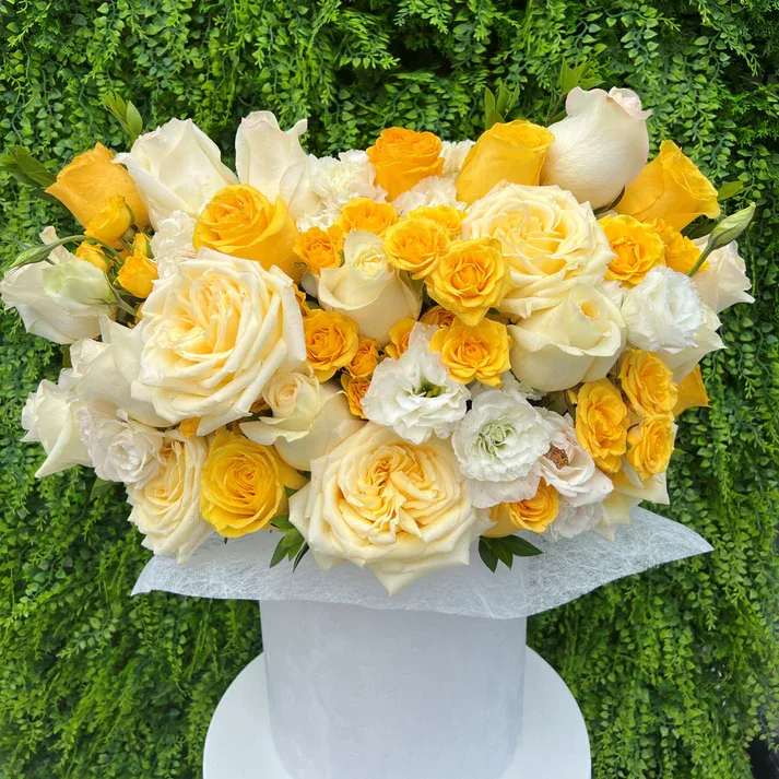 #12 Feliz - Feliz is a vibrant celebration of joy, warmth, and beauty — perfect for birthdays, congratulations, or simply “just because.”  Seasonal or not available flowers can be replaced with a similar one. Vase can also be replaced with others.