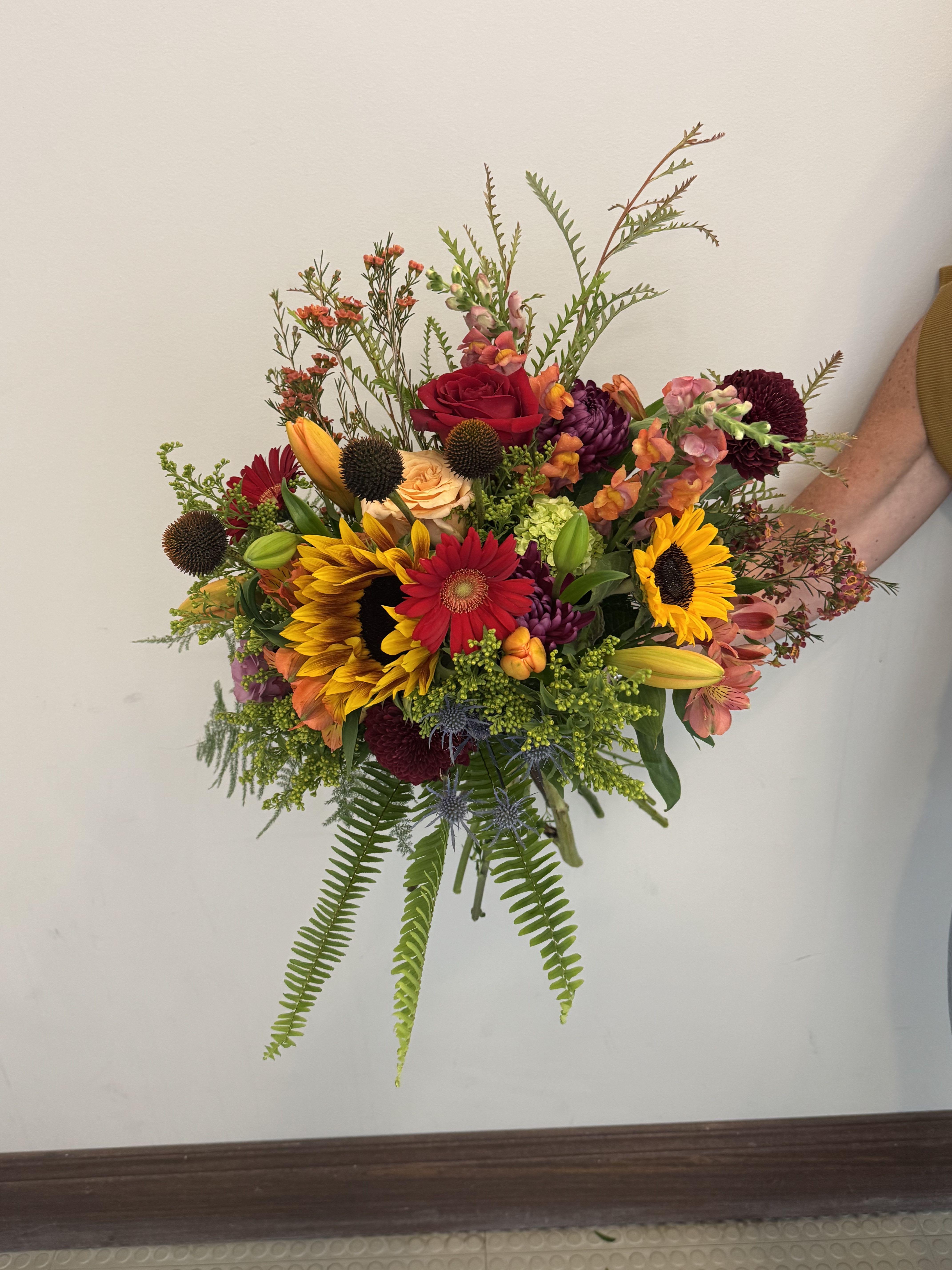 Autumn hand tied bouquet Autumn hand tied bouquet - Beautiful mixture of autumn tones and textures of the season. This hand tied bouquet comes wrapped and ready for you to use your vase or vessel.