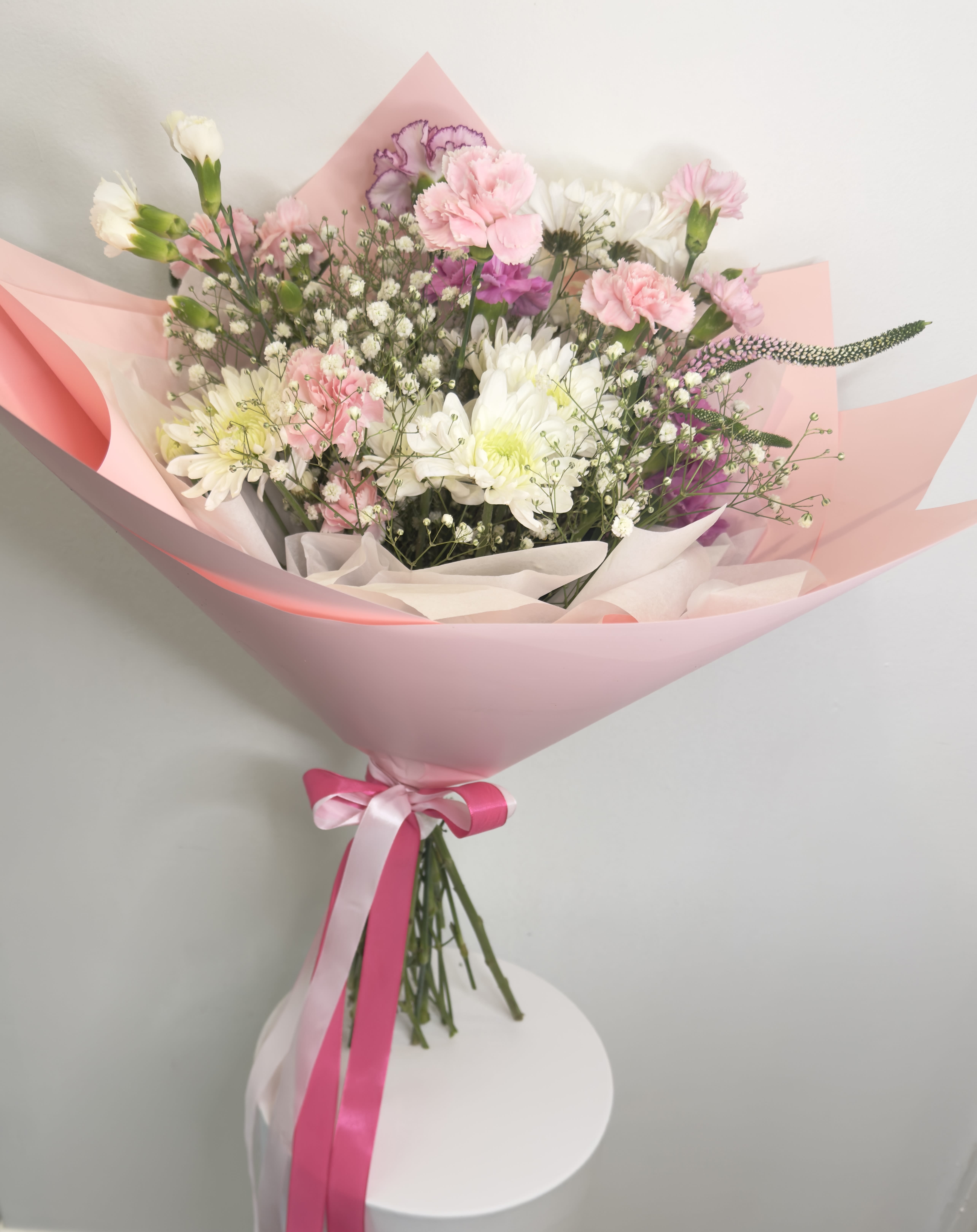 Sweet Blossom - a sweet Blossom of shades of pink and white suitable for any birthday,expression of love,appreciation,graduation or any  other event you celebrate.  Arrangement includes -Fresh flowers -Wrapping paper -Greeting card