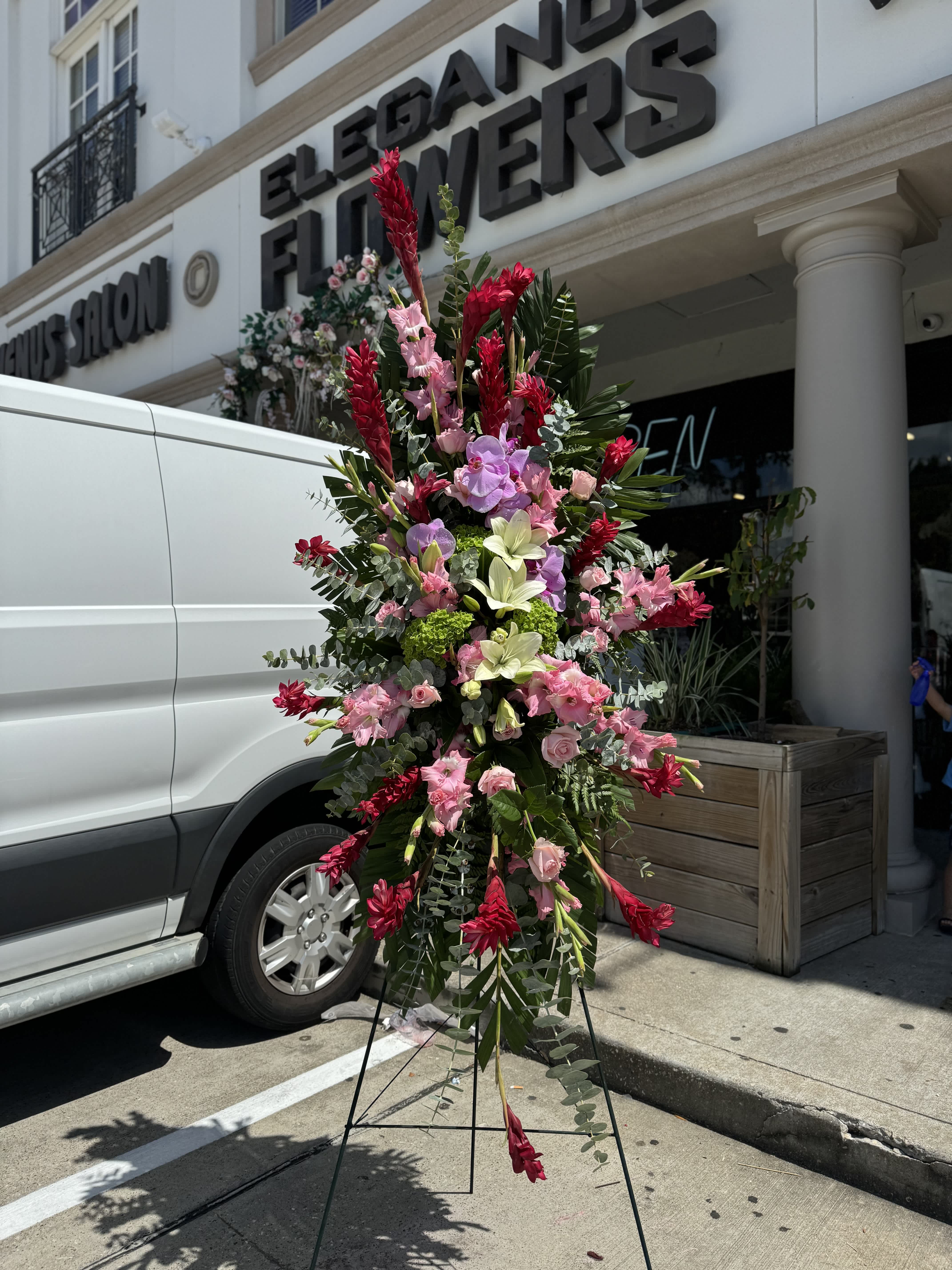 Easel #14 Online Easel #14 Online - A standings flower arrangement for a funeral service is a heartfelt tribute designed to honor and celebrate the life of the deceased. These arrangements are typically displayed on an easel or stand, making them highly visible and a central part of the memorial decor.