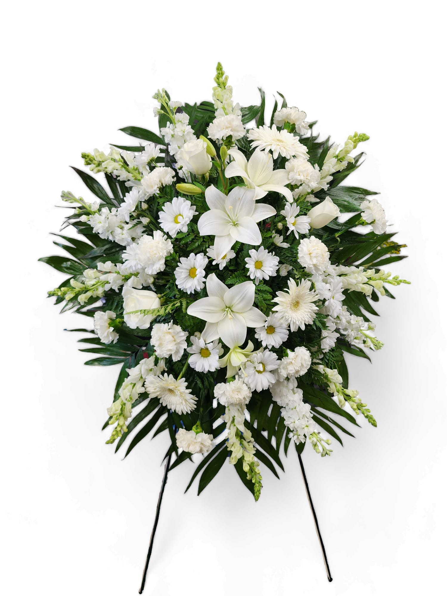 Loving Remembrance - This elegant all-white standing spray features a graceful arrangement of snapdragons, Asiatic lilies, roses, and a variety of other pristine white flowers. Its timeless design evokes a sense of peace and purity, perfect for commemorating a loved one or honoring a special occasion. The combination of delicate blooms creates a serene and dignified tribute, with each flower adding its own beauty to the harmonious composition.