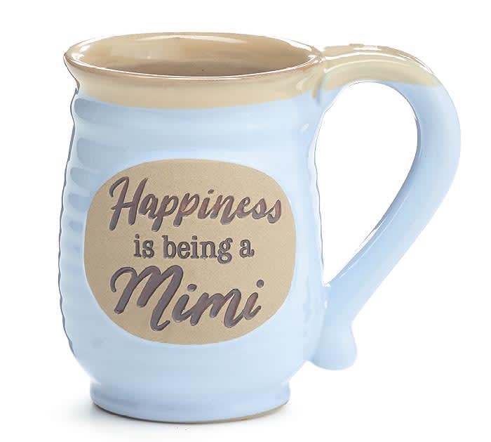 MIMI mug 14oz MIMI mug 14oz - Dishwasher safe/FDA approved/Microwave safe. Hand-painted porcelain blue mug with a raised emblem on the front. Message reads "Happiness is being a Mimi." Interior is tan and handle is blue. Individually gift boxed. 4.5"H x 5.5"W x 4"Depth. 3"Opening. Capacity: 14 oz.