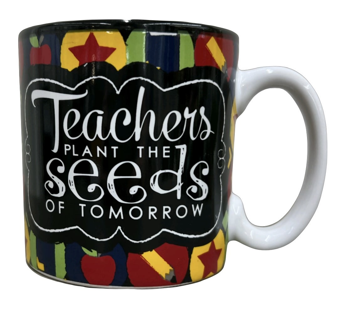 Teachers Plant The Seeds Of Tomorrow Mug (LOCAL DELIVERY AND PICK UP ONLY) Teachers Plant The Seeds Of Tomorrow Mug (LOCAL DELIVERY AND PICK UP ONLY) - Dishwasher safe/FDA approved/Microwave safe. Ceramic decal mug with black interior and a colorful exterior with the saying "Teachers Plant The Seeds Of Tomorrow". Includes a gift box. Holds 13 ozs. You can customize a floral arrangement to go in this mug. FCF-9726847 This gift is exclusive to our shop only and available to local pickup and local delivery. This item CANNOT be wired out.