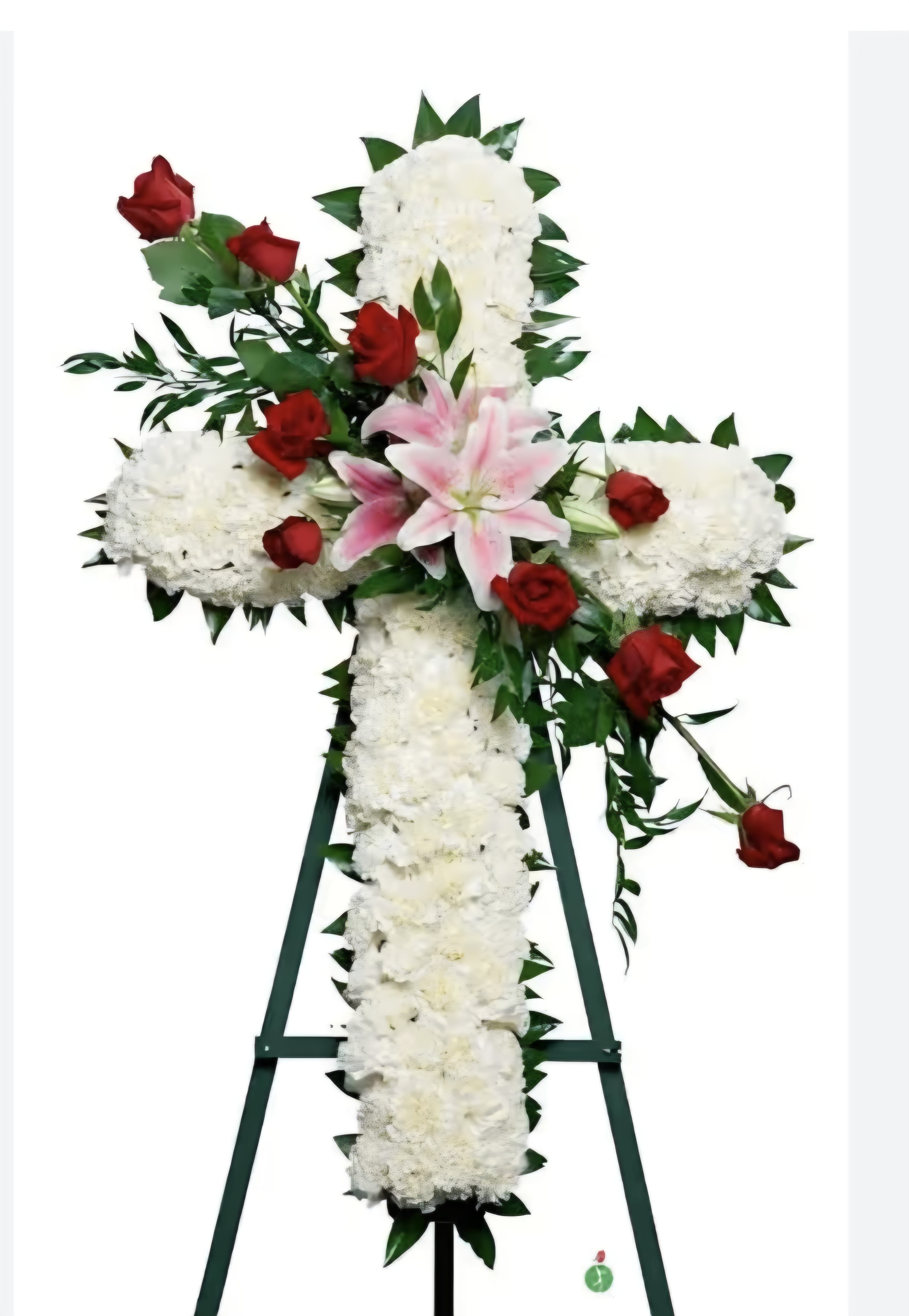 Simple Blessing - Standing cross easel, dressed in solid white and accended in roses and pink lilies. This cross will be a true statement for a loved one.