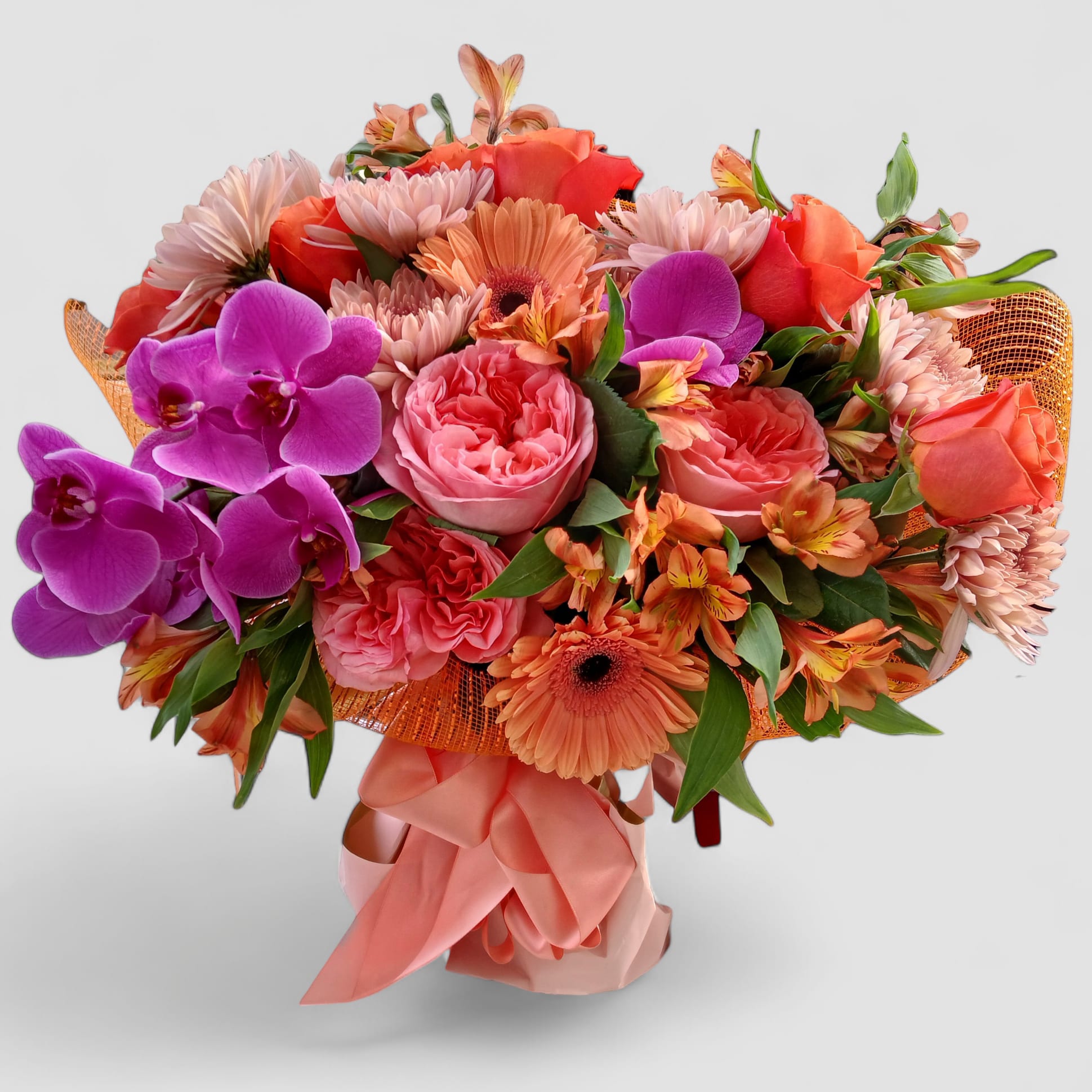 The Beautiful One Blush Blossoms - Send this beautiful blush blossom bouquet today to make their day. Perfect to send for every reason with it's vast amount of roses orchids daisies and more wrapped in pretty peach and gold paper and mesh. Send happiness.