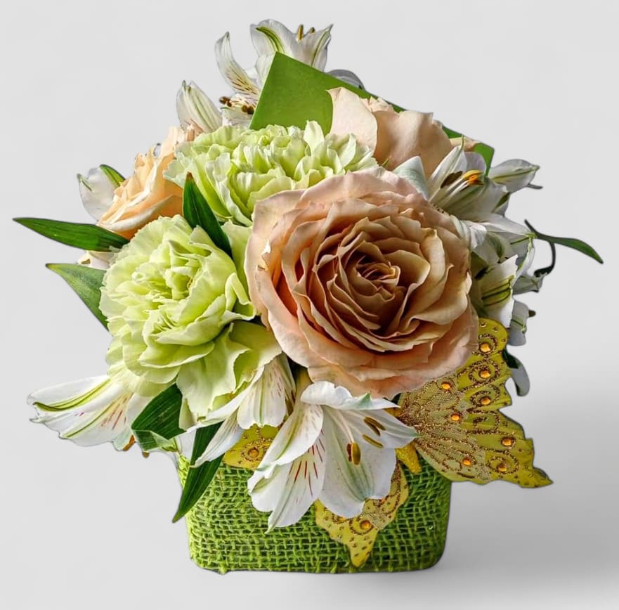 Get Well Designer's Choice - Roses and more arranged in a modern glass cube vase wrapped in healing citrus jute ribbon. Always made special and unique each time. Send them a little get well.