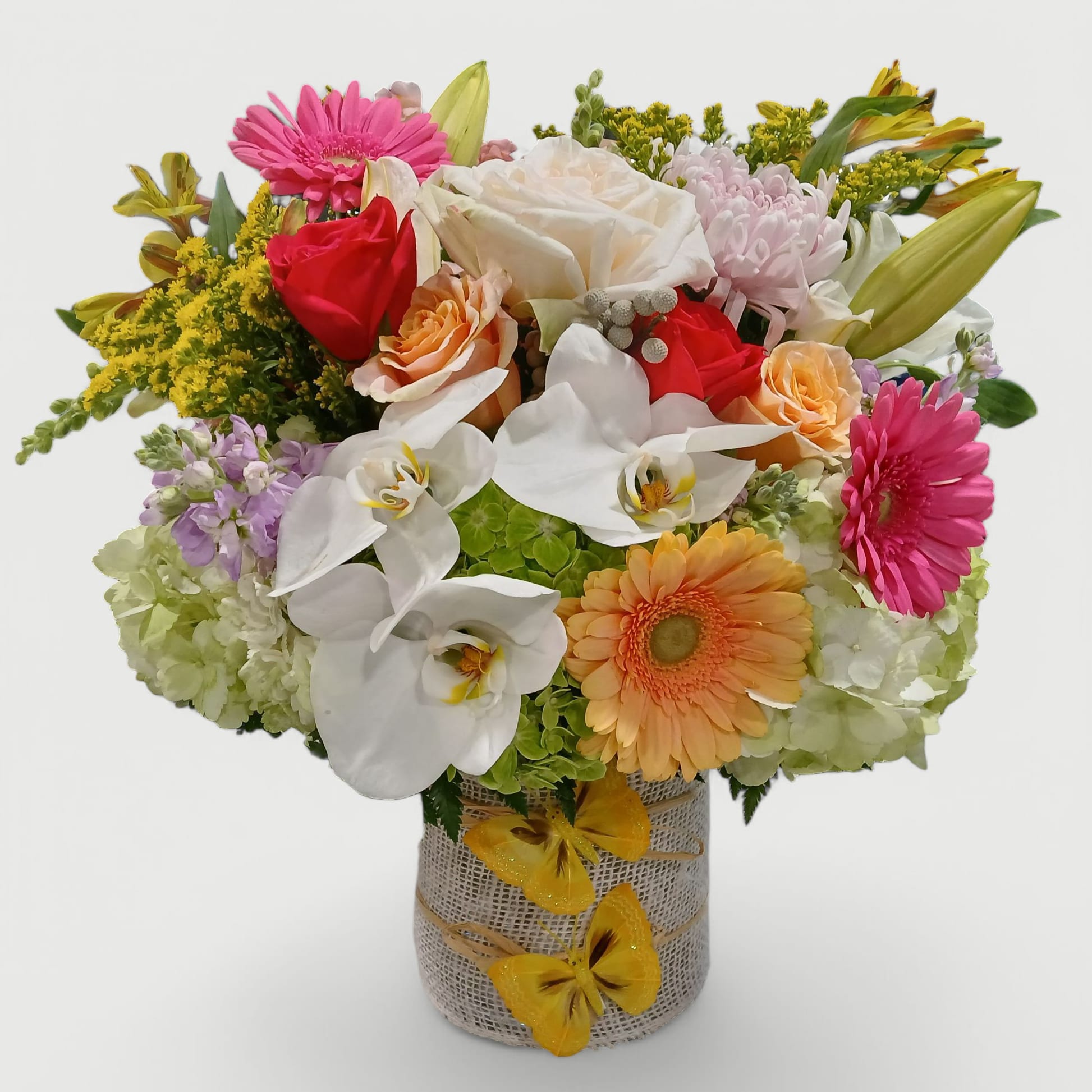 Big Beauty Bouquet Designer's Choice - Send this gorgeous designer's choice style big beauty bouquet today to let them know how much you care with it's lovely mixed spring time blossoms of that day roses orchids and more arranged in a tall modern glass cylinder vase style wrapped in beautiful vanilla jute ribbons. Perfect to send for every occasion. All bouquets are always made extra special and unique each time. Please check out my beautifully gallery. Send them happiness today.