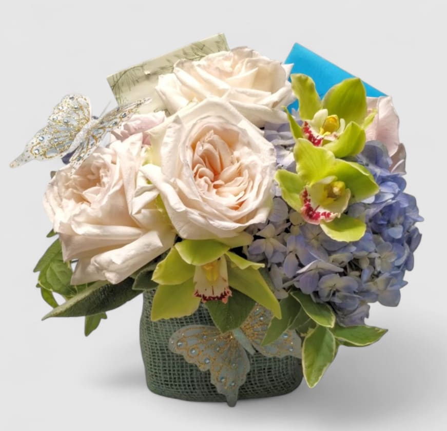 Every Occasion Bouquet Designer's Choice - Designer's choice; made beautifully from my pastel blossom selection of the day roses orchids and more arranged in a modern glass cube style vase. Perfect for every occasion to show them how much you care. Always made unique and extra special each and every time. Send them happiness.