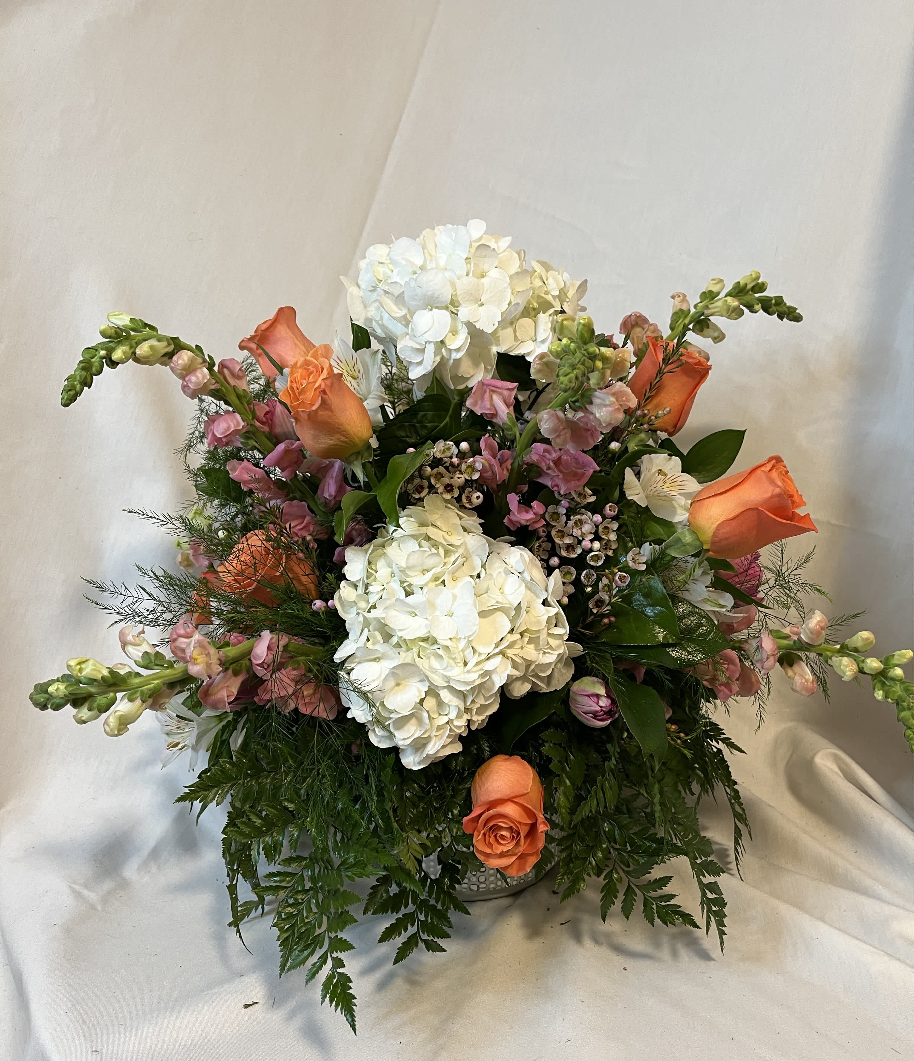 Just Beautiful Just Beautiful - Lovely arrangement of hydrangea, roses, tulips, and snapdragons in luscious greens.