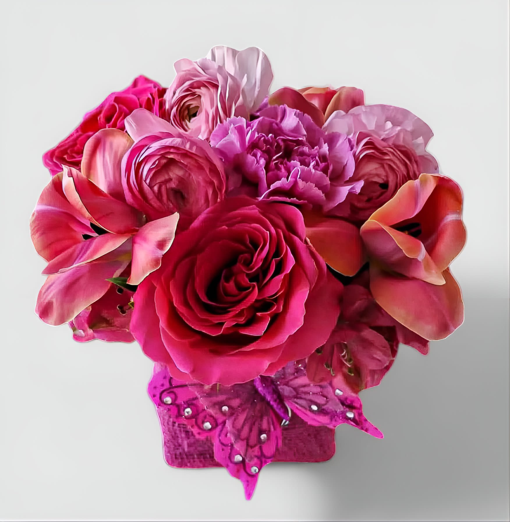 Hot Pink Beauty Hot Pink Beauty - Designer's choice; made beautifully from my hot pink blossoms of the day roses and so much more arranged in a modern glass cube style vase wrapped in hot pink jute ribbon. Beautiful and perfect to send today to make them smile. Always made extra special and unique each and every time. Send them happiness.