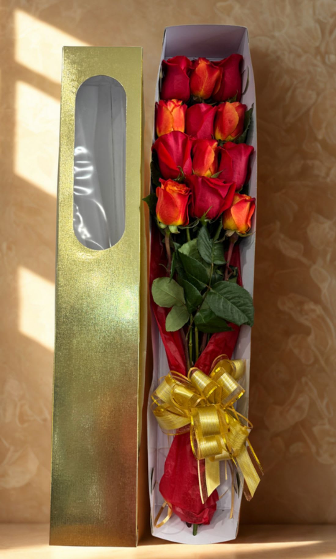 Simply You  by D'Lily's Flowers  - A simple yet elegant dozen roses placed in a box for a delicate display.