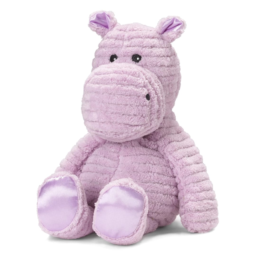 My First Warmie - Hippo  - My First Warmies® are made with the softest fabrics and silky satin details that add an elegant touch while providing a tactile feel your child is sure to love. Like the original Warmies®, these super cute heatable characters are gently scented with French lavender to help your child feel cozy and secure. Simply warm in a microwave to provide up to an hour of soothing warmth and comfort.  Quick Facts: Simply Warm in a Microwave Soothes, Warms and Comforts Scented with Real French Lavender Chill in a Freezer for Cooling Relief Safe for all Ages Dimensions: 13”x6”x4” Weight: 2lbs