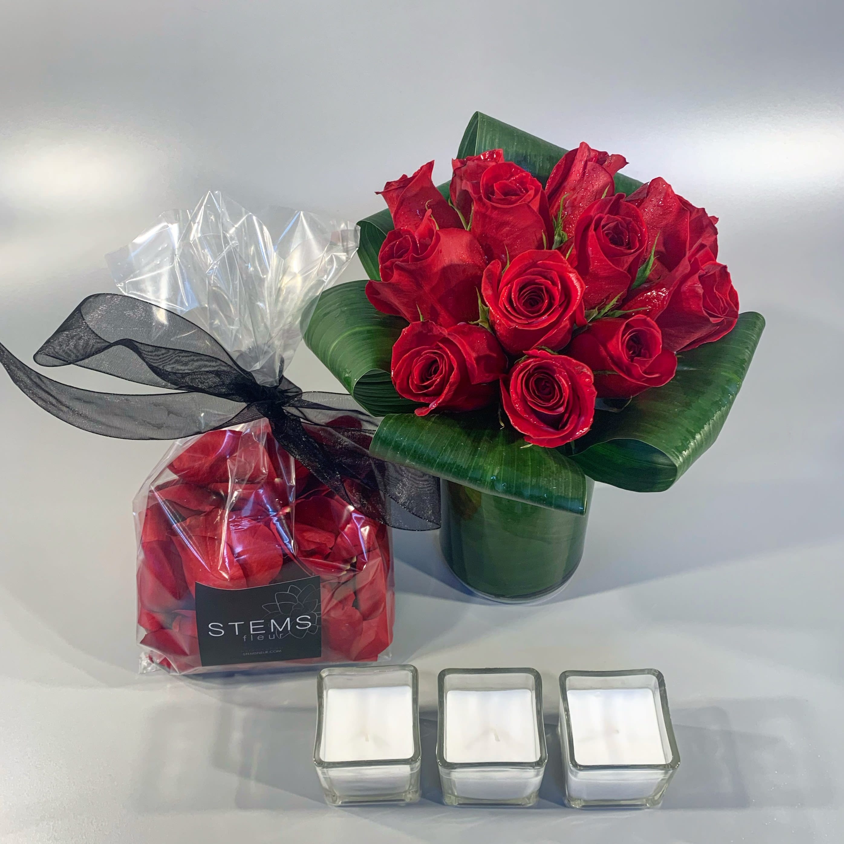 ROMANCE COLLECTION ROMANCE COLLECTION - This romance collection is the perfect way to begin or end your romantic Valentines date. We've included a bouquet of roses, a bag of romantic rose petals you can scatter anywhere, and 3 votive candles.