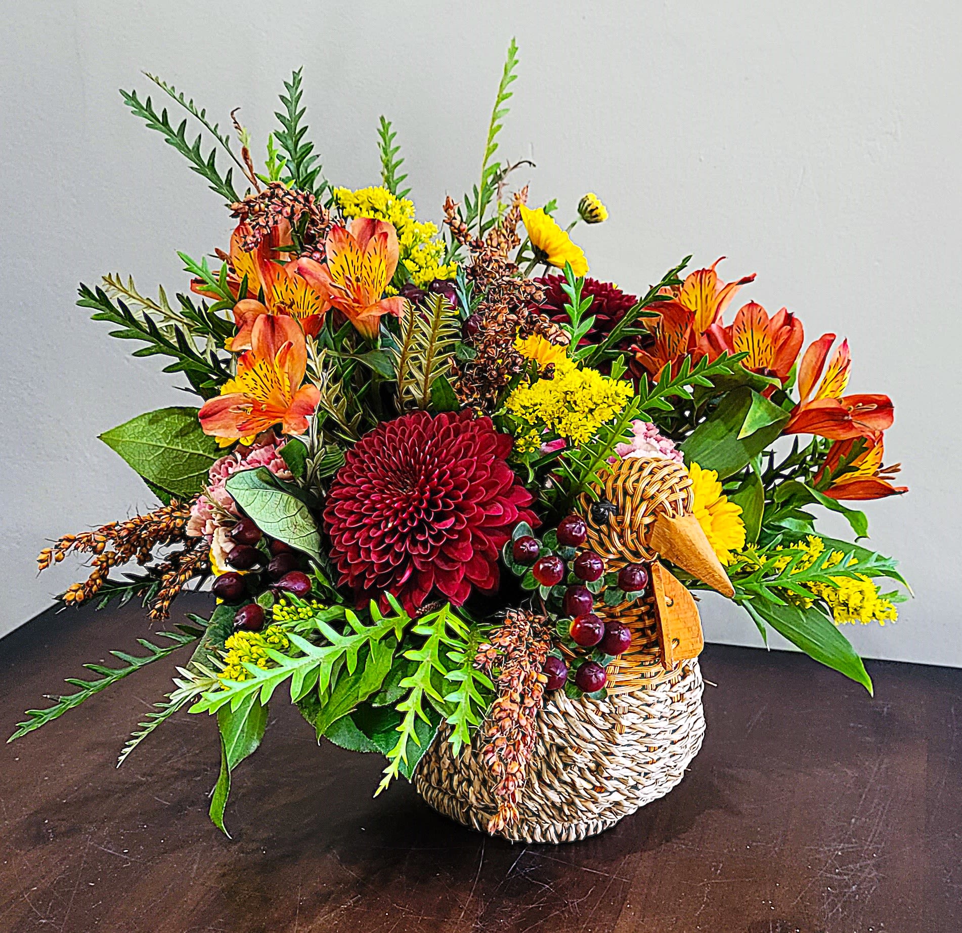 Gobble Me Up! Gobble Me Up! - Celebrate the Autumn Harvest with this fun Turkey basket filled with Cremon mums, Broom Corn, Alstroemeria, carnations, fall asters and mixed greens.