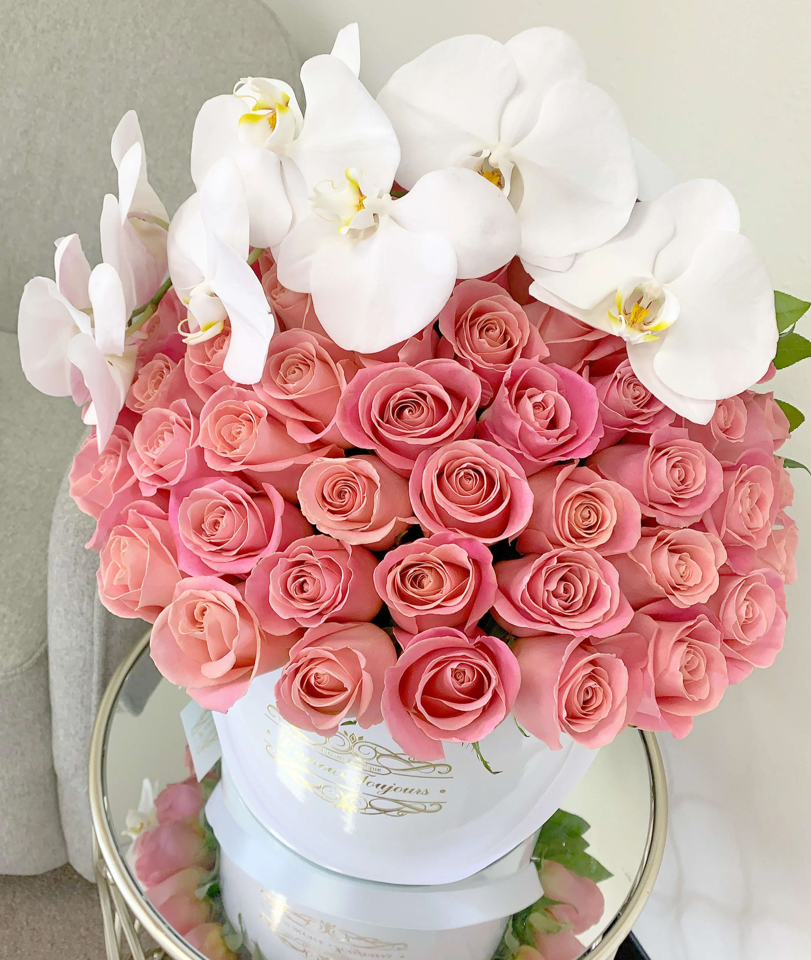 Pink Tendre Signature Box II - 50 Roses with a stem of orchids in our Signature Box