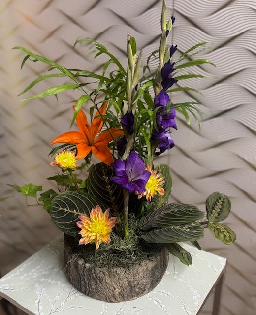 Dish Garden Planter with fresh flowers added Dish Garden Planter with fresh flowers added - Planter filled with English Ivy, Calathea, Lady Palm,and seasonal flowers