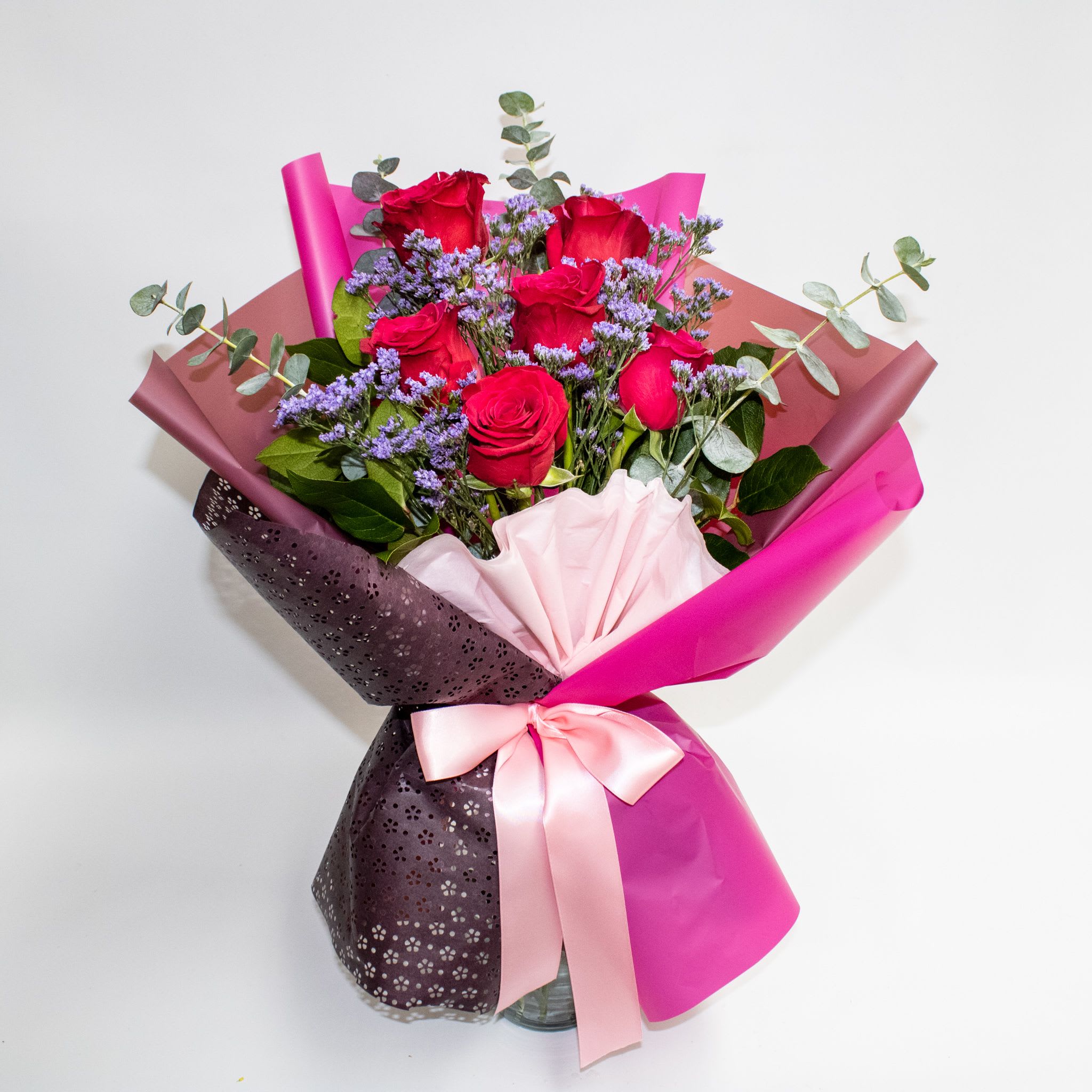 City Vibe City Vibe - Hot pink Theme Bouquet. Bouquet contains Hot pink rose and eucalpytus. Standard contains 6 hot pink roses Deluxe contains 8 hot pink roses Superior contains 10 hot pink roses. Please note Wrapping technic and wrapping color may different. Vase is not included