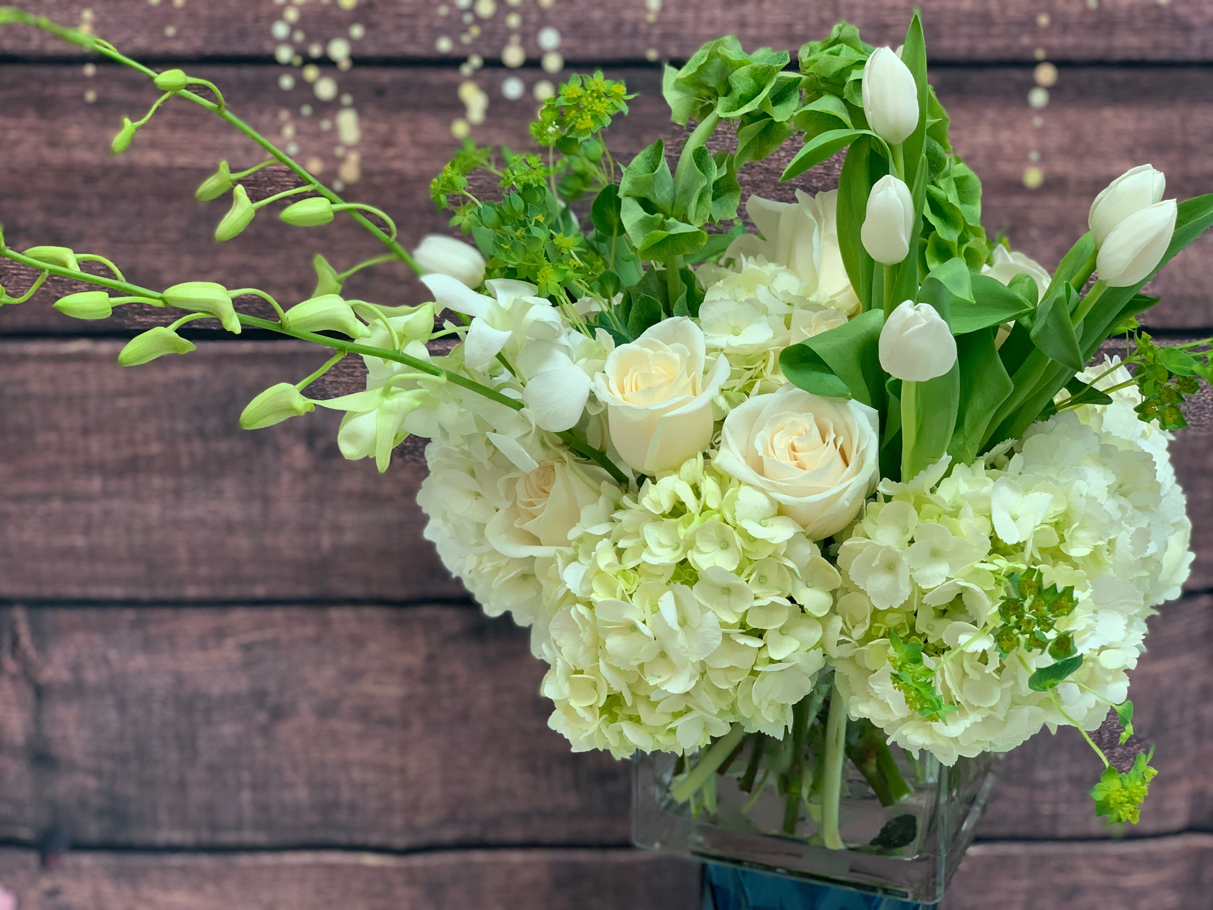 Jaw dropper - An XL mix of jumbo hydrangea, roses,  tulips, orchids, and our freshest unique greens