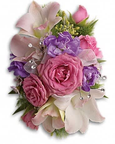 Purple Love Wristlet Purple Love Wristlet - A luxurious array of purple, pink and white blooms on a faux pearl cuff. Pink dendrobium orchids and spray roses, with hints of purple stock, pink waxflower, ming fern and seeded eucalyptus on a faux pearl cuff.