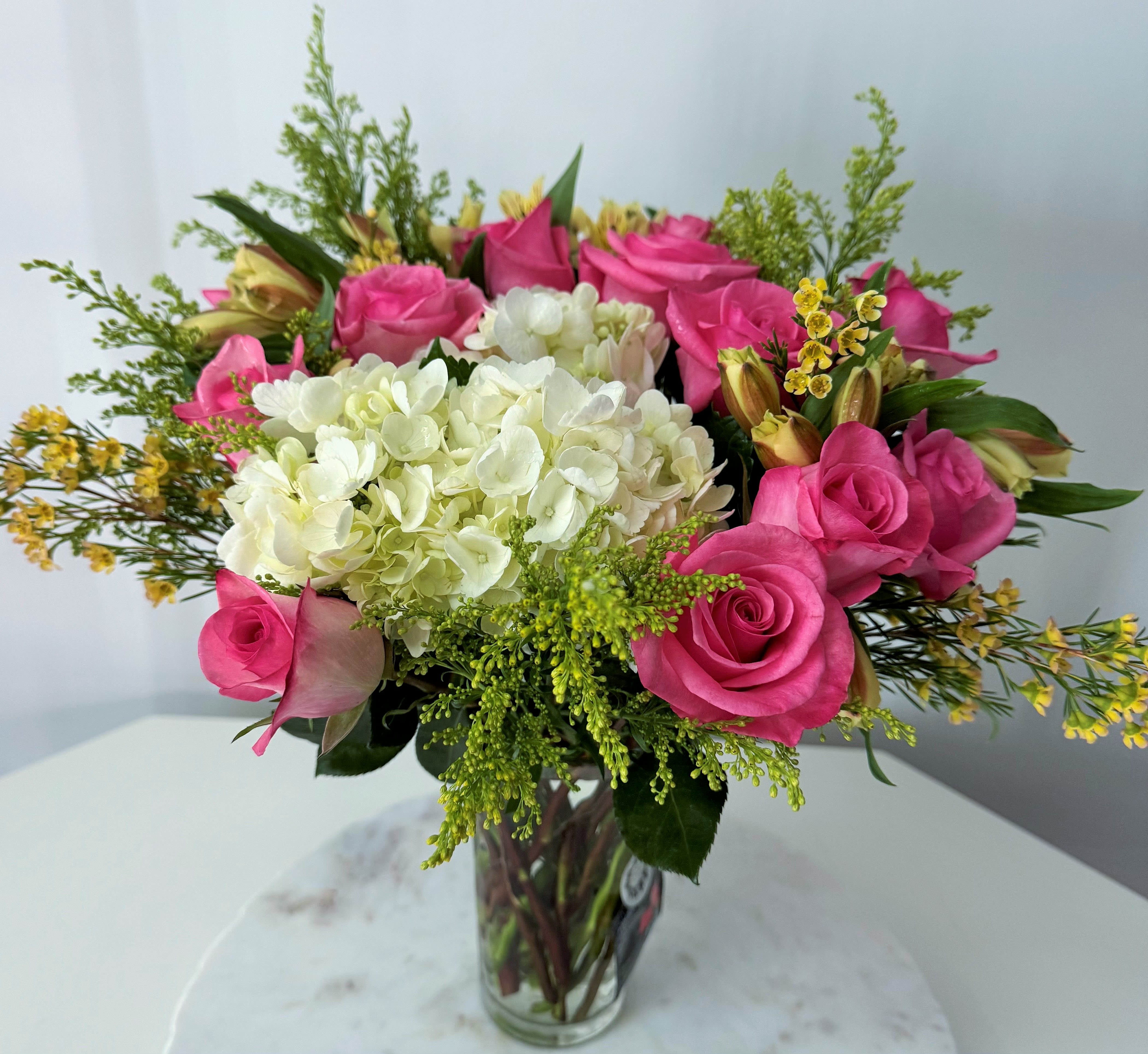 Spring Garden By Mercy's Flowers - Spring Garden is a fascinating yellow and green colors that enhance the pink in spring  , it's the most beautiful &amp; elegance harmony, a true delight of Spring Joy.
