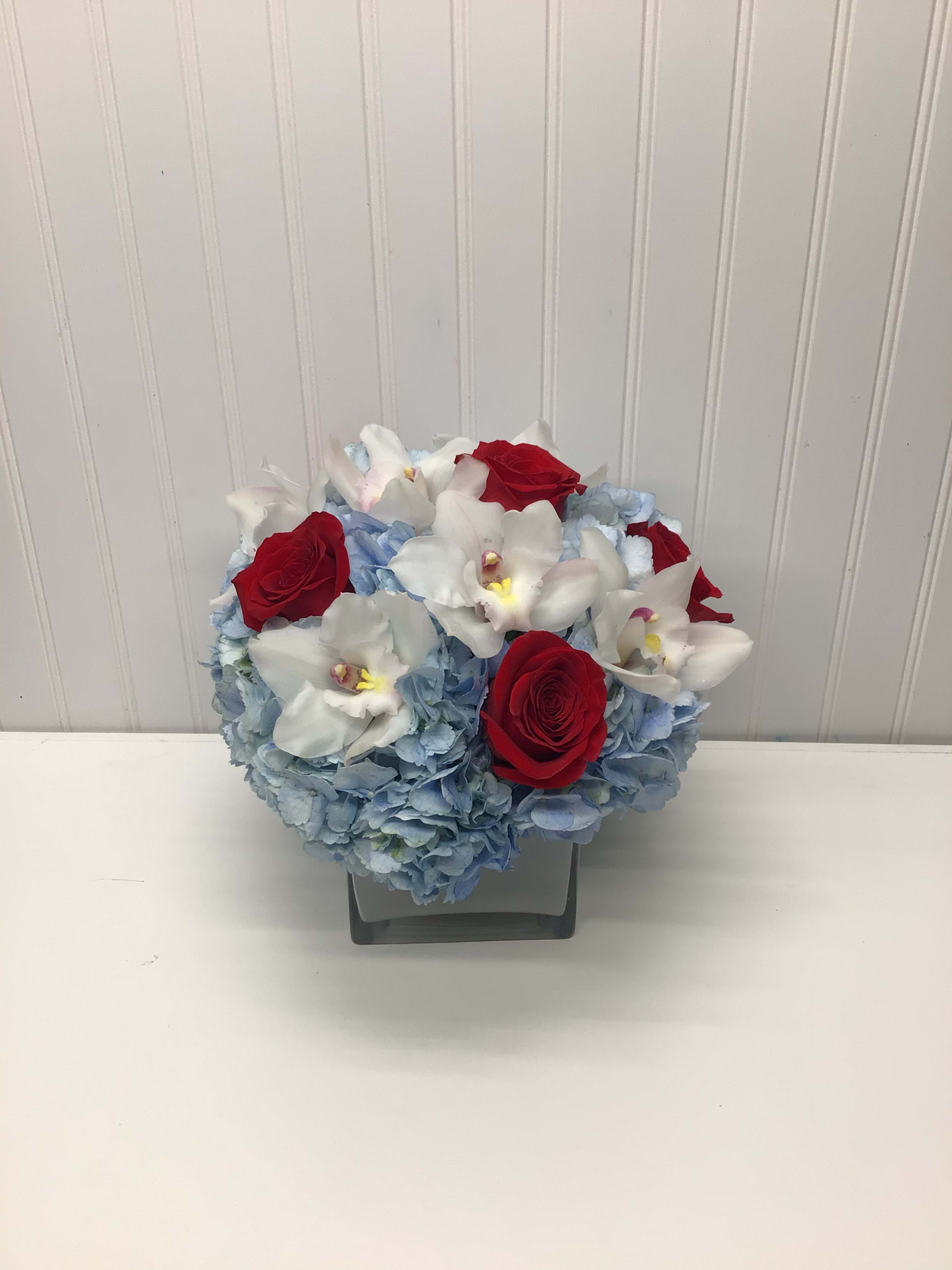 Ashley  - Lovely reds and blues with white come together in this romantic gift 