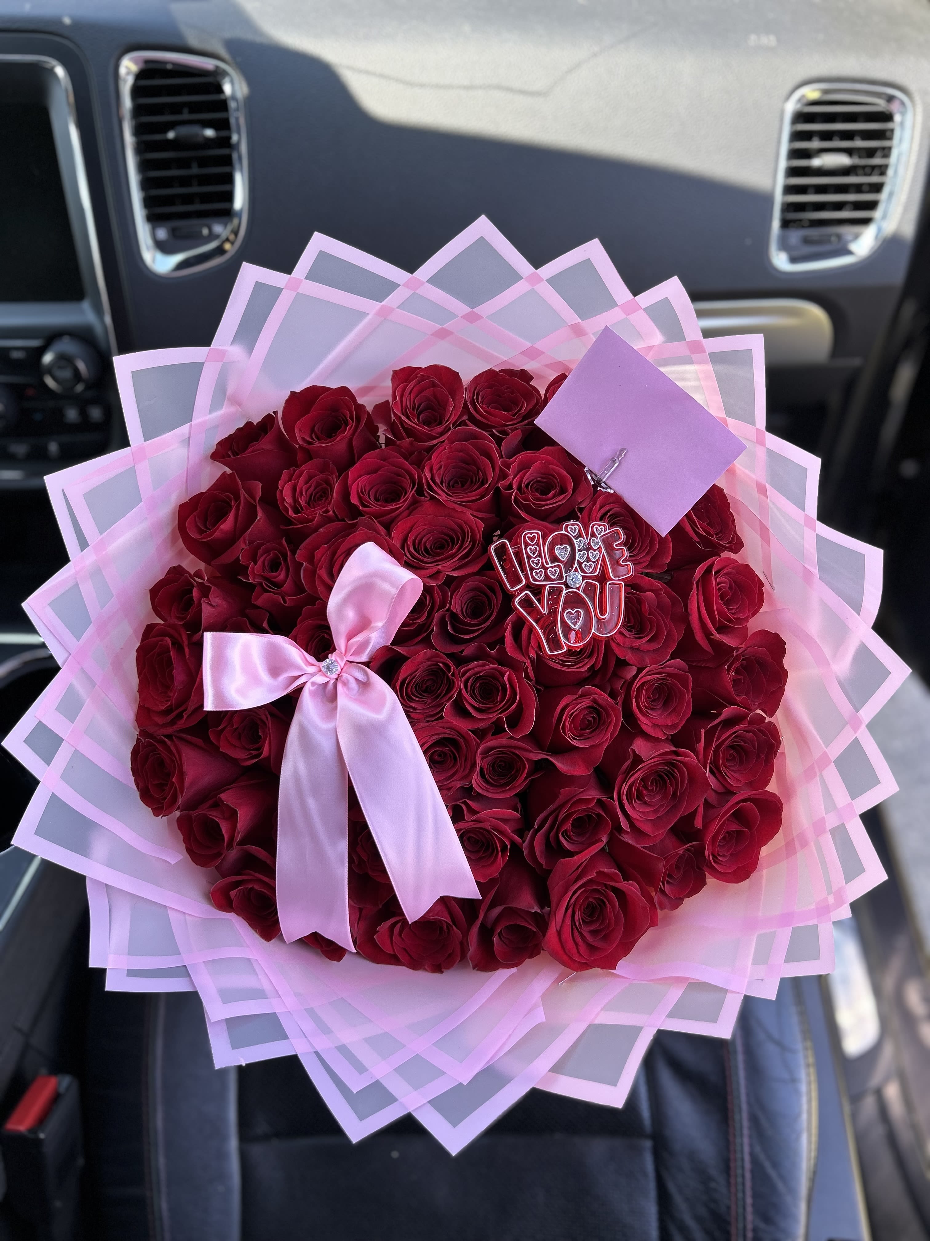 50 Red Roses Pink Paper 50 Red Roses Pink Paper - 50 Red roses with pink paper and bow