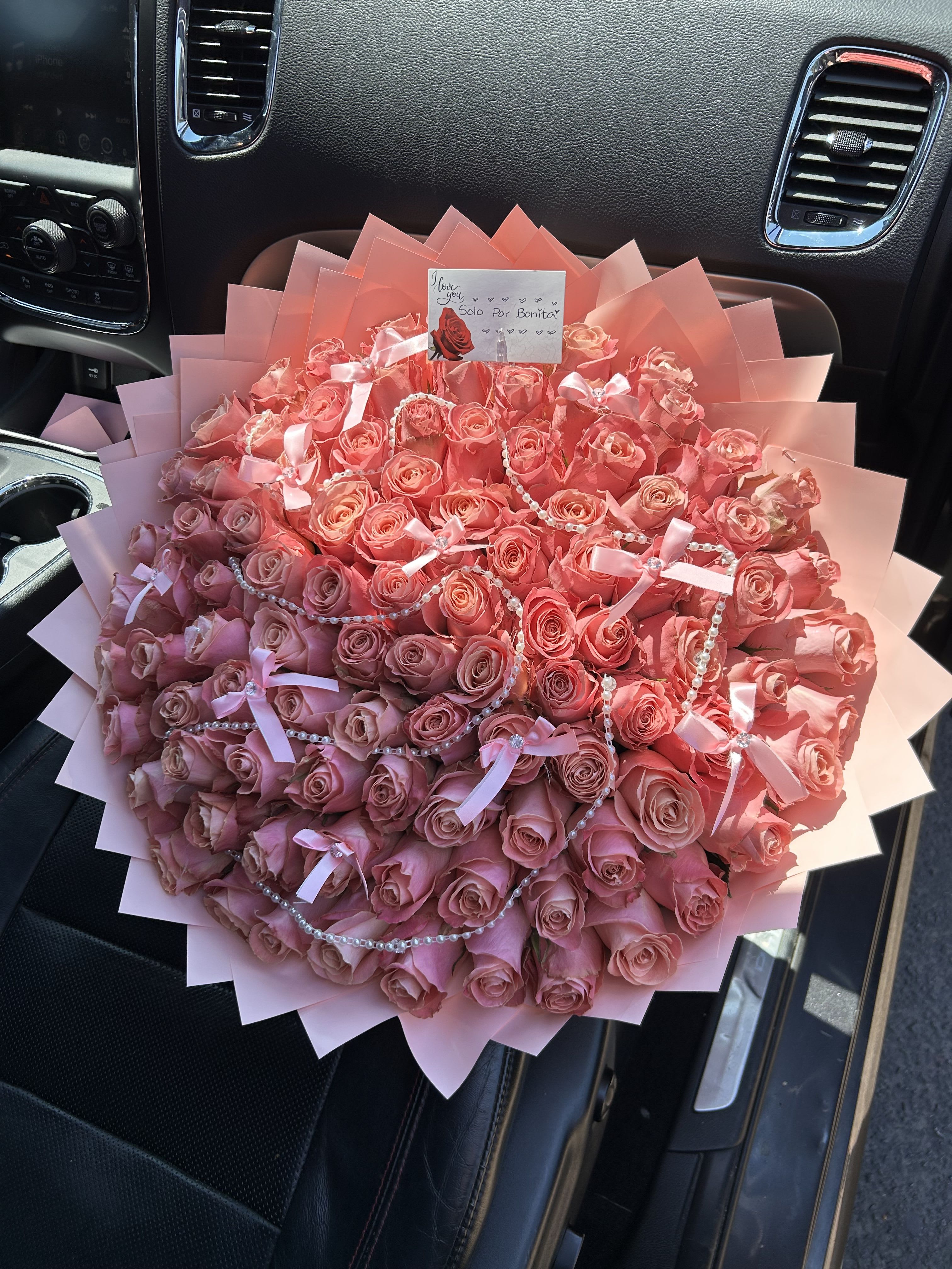 Pearls &amp; Bows - 100 pink roses, complete with pink paper, pearls and mini bows 