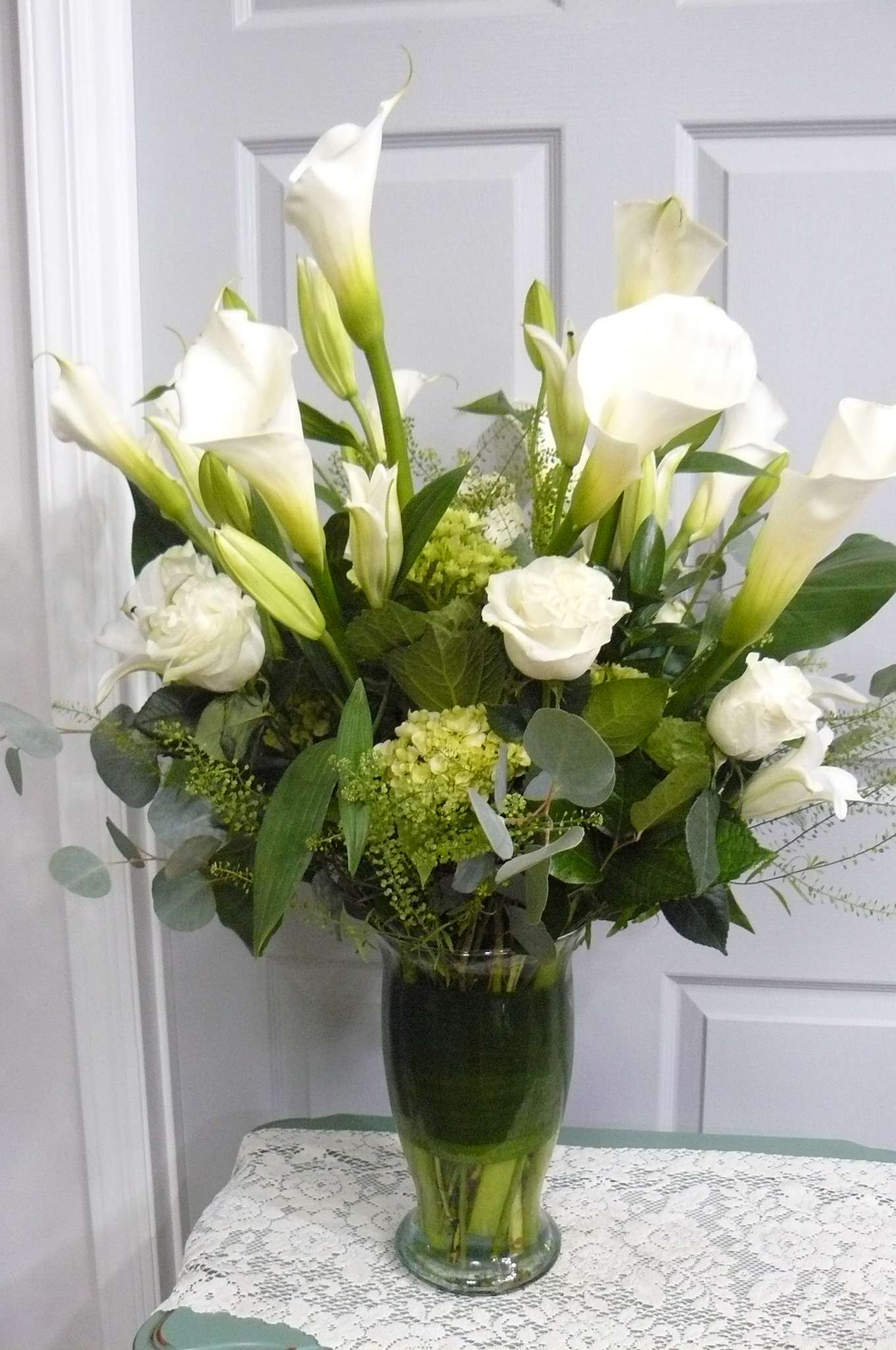 Grande Sympathy Arrangement (Pre-Order)  - Calla-Lilies, Roses,  Lilies,  Hydrangea,  Eucalyptus, Assorted Fancy Greens