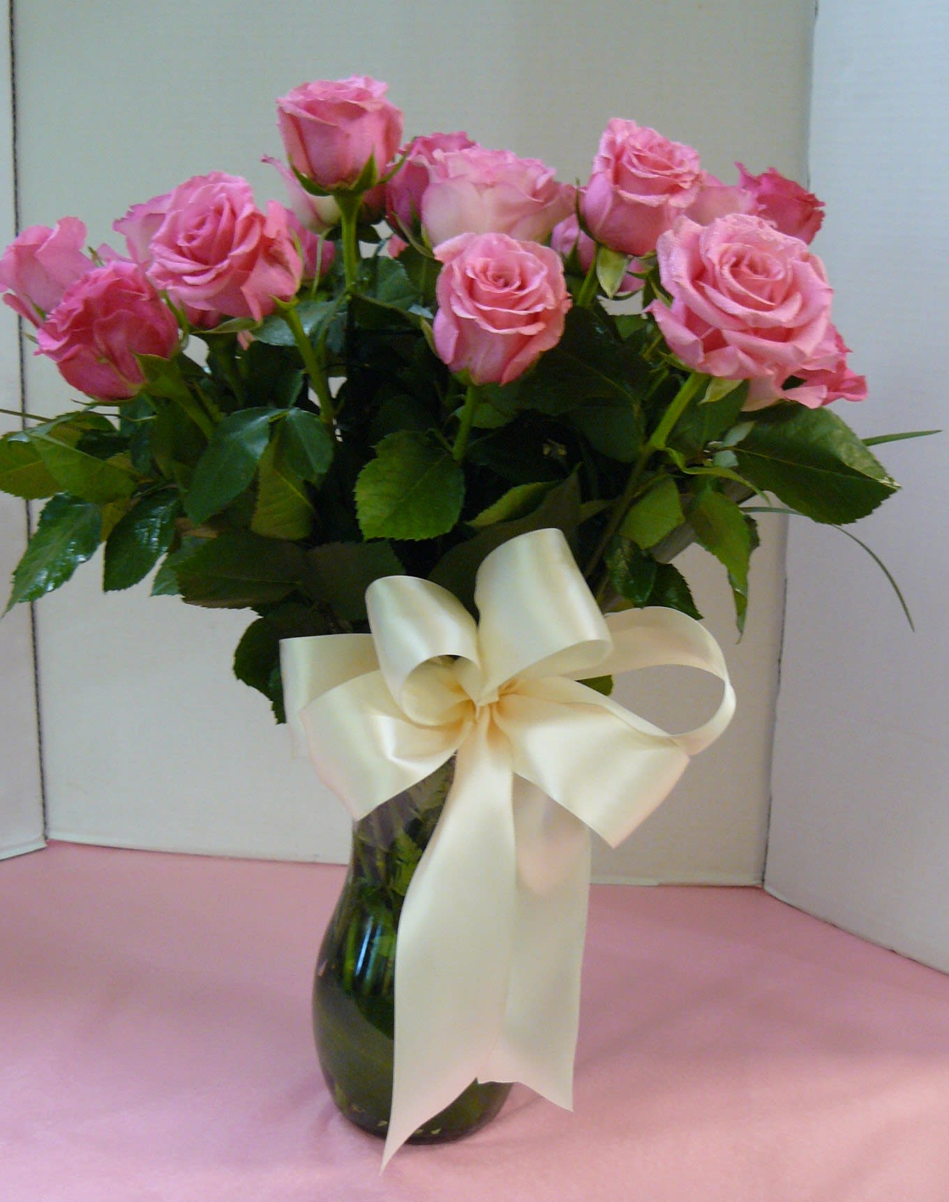 Pink Roses Tall Arrangement   - Pink Long Stem Roses , Fancy Greens in Tall Glass Vase