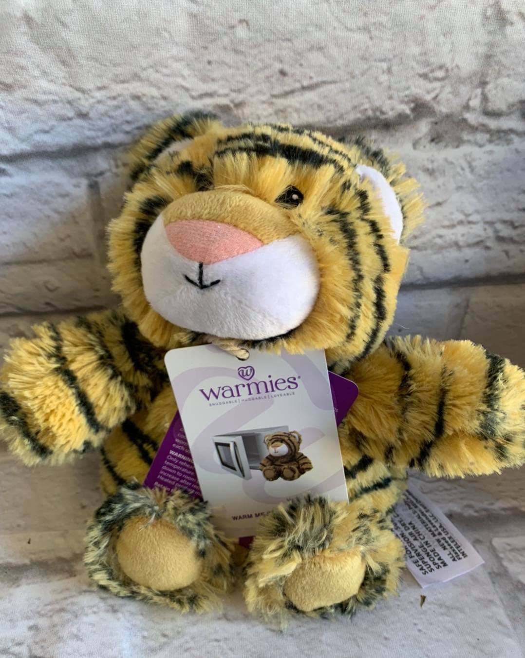 Warmies Warmies - Adorable Plush Warmies! Fully microwavable, lavender scented plush soft toy. Filled with specially treated grains and lavender. Can also be used as a cold pack by simply placing in a plastic bag and putting it in the freezer. Surface washable with a damp cloth. Warmies are suitable for all ages!