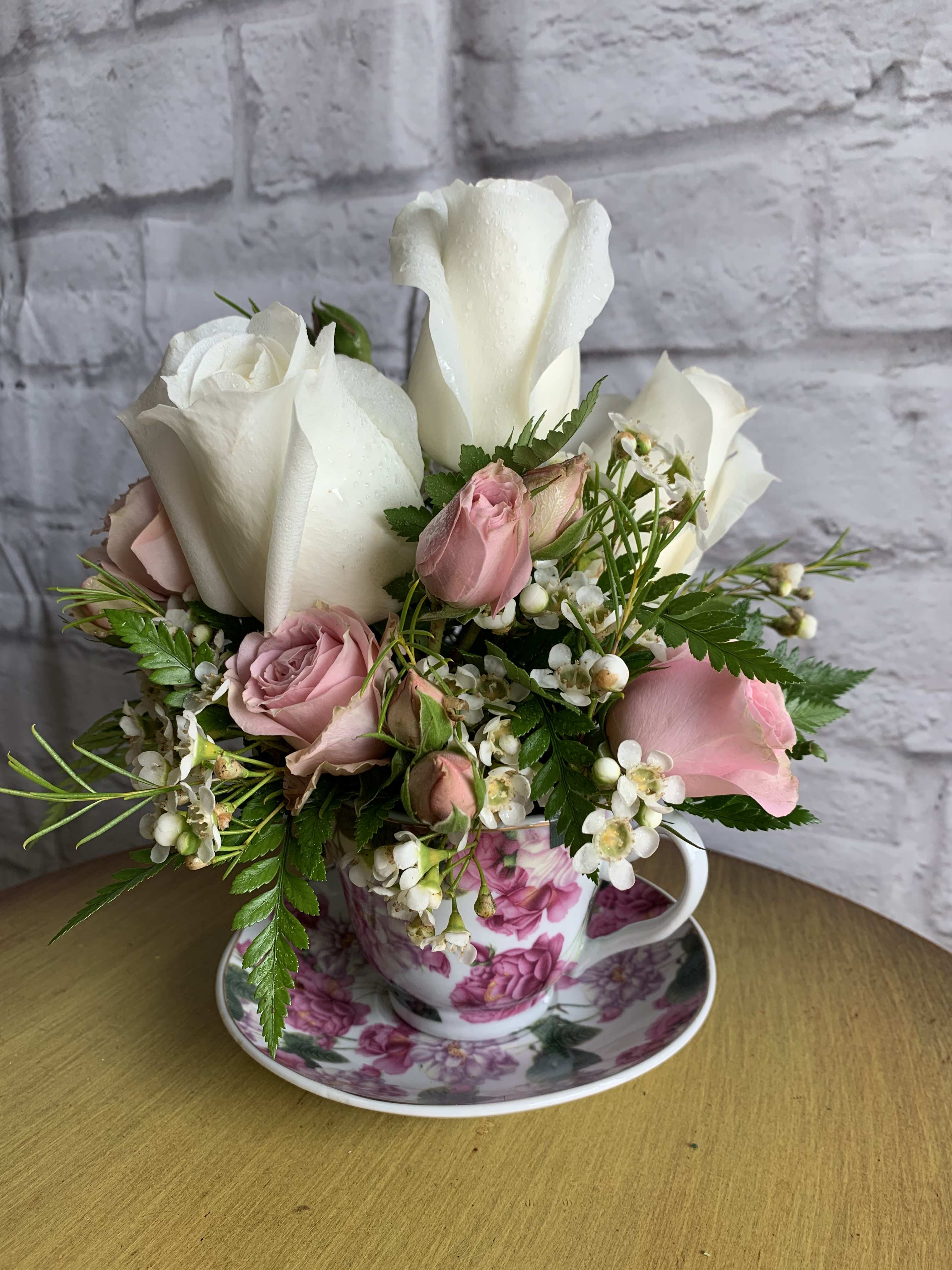 Cafe' de Fleur Cafe' de Fleur - A unique & charming porcelain cup and saucer is delicately filled with Roses. **The colors and patterns will vary to make this ever so thoughtful gift unique for every recipient and occasion**