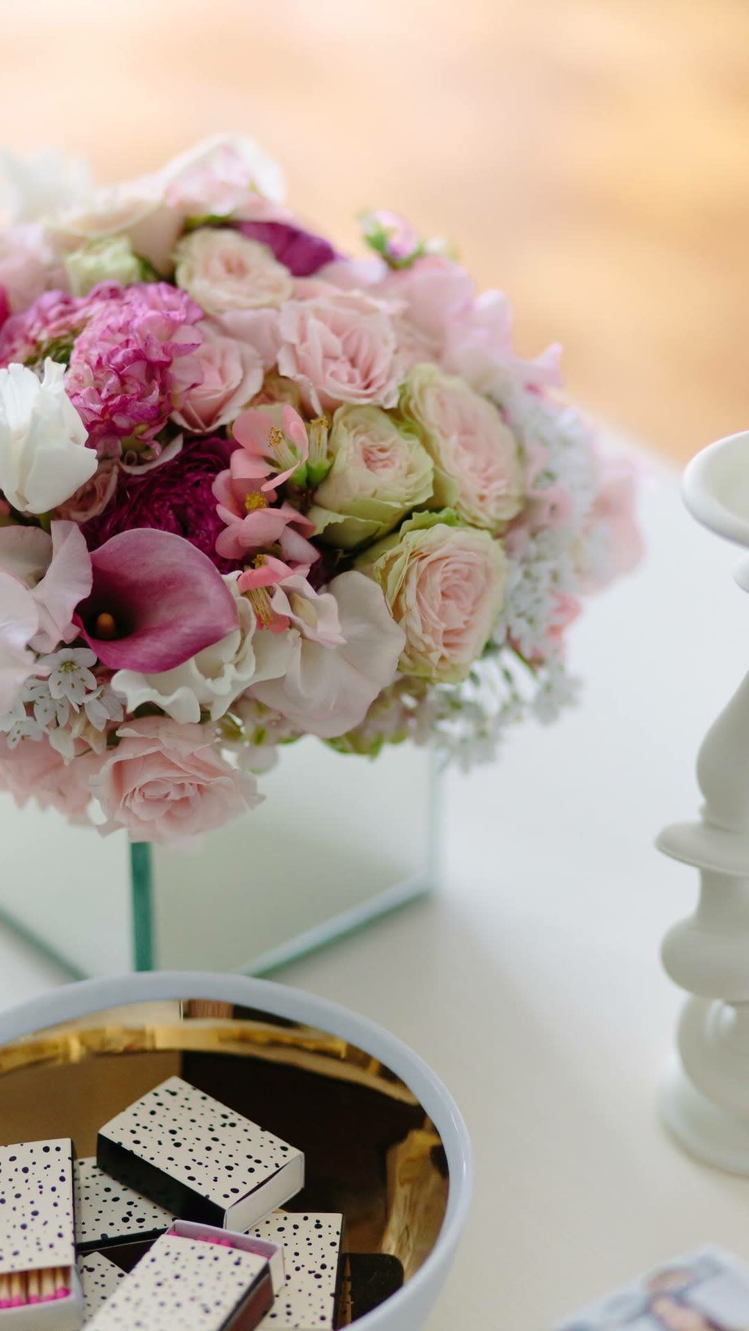 France center piece  - Square mirror glass vase with romantic ranunculus,mini calla lilies, spray roses, and sweet pee.   