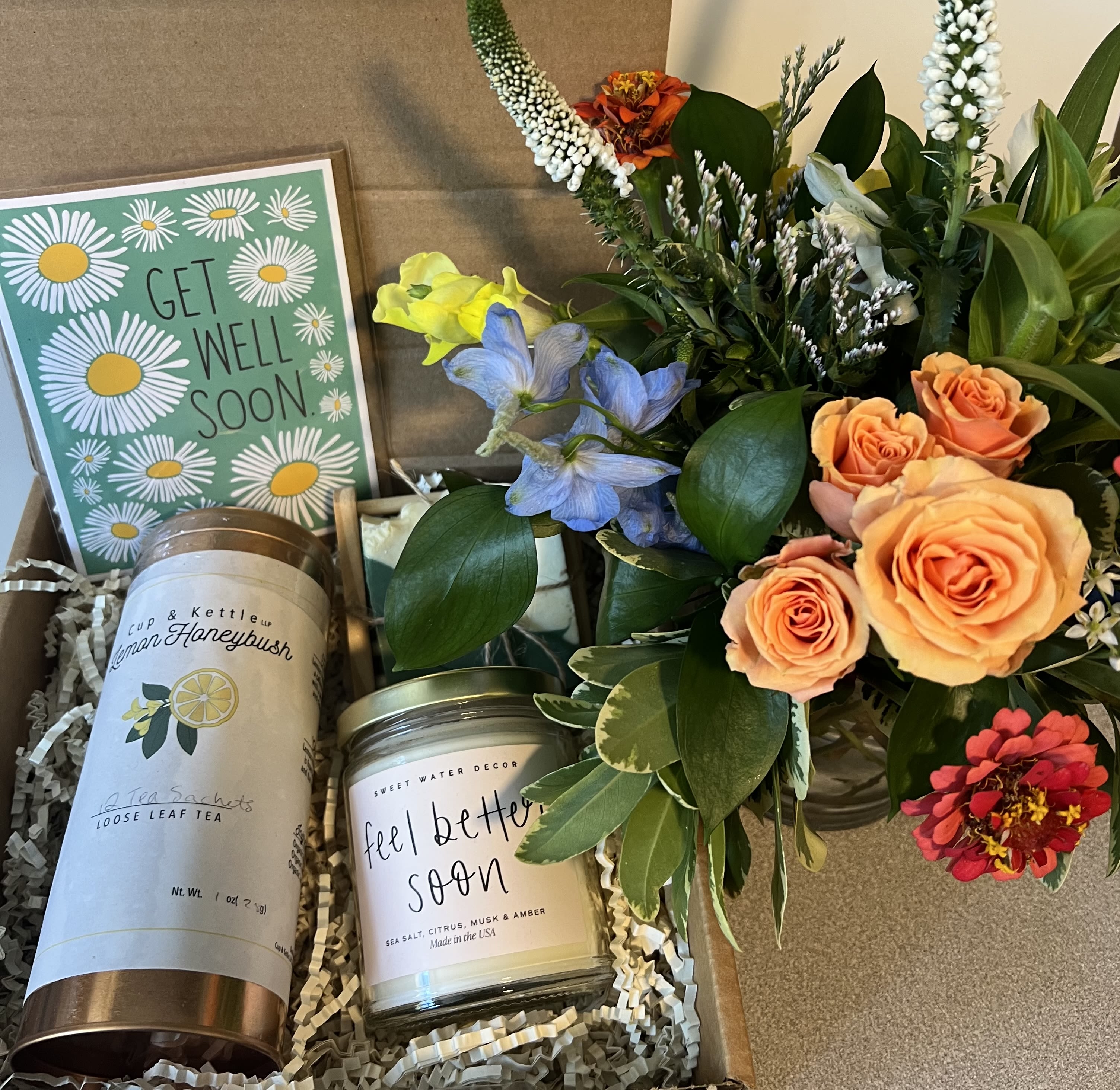 Get Well Soon Gift Set  - A little pick me up bundle!   1 petite designers choice arrangement  1 get well soon card 1 eucalyptus soap and soap dish 1 feel better soon candle  1 canister of lemon Tea 1 honey spoon