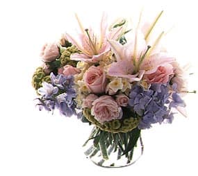 Georgina's Bubble Bowl - An expression of color, texture and tone, Georgina's beloved bubble bowl features and abundance of roses and lilies. Favored in spring tones, the arrangement can also be created in many more color palattes 