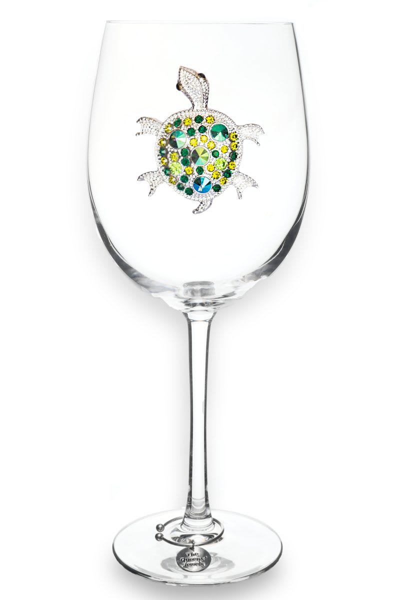 Sea Turtle Jeweled Queens Jewels Wine Glass Sea Turtle Jeweled Queens Jewels Wine Glass - Add sparkle to your beach/nautical decor with this Sea Turtle jeweled wine glass. It is silver and diamond with gorgeous hues of greens and blues. It is exquisite