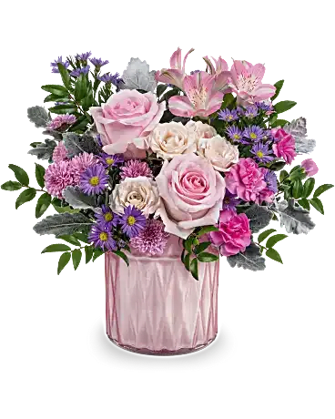  Dazzling Gem Bouquet - Add a touch of elegance to any space with Teleflora's Dazzling Gem Bouquet, a stunning arrangement of pink and purple blooms. Designed in a pink pearlescent vase that shimmers with timeless beauty, this radiant centerpiece is a gift to be cherished for years to come. Teleflora's Dazzling Gem Bouquet features a gorgeous mix of pink roses, crème spray roses, pink alstroemeria, hot pink miniature carnations, lavender button spray chrysanthemums, large purple Monte Cassino asters, dusty miller, and huckleberry. Artfully arranged in a pink pearlescent vase, it's a radiant and timeless gift. Orientation: All-Around 