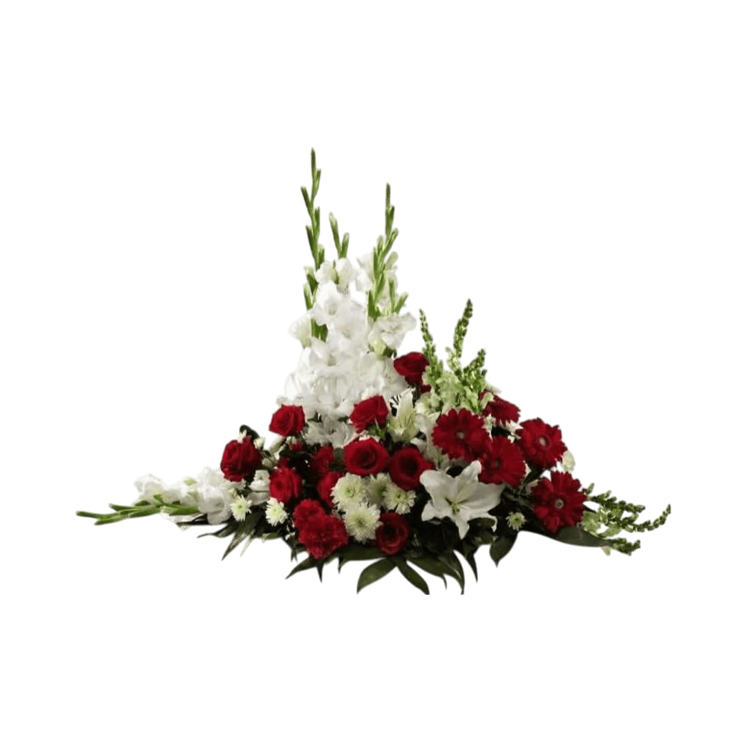 Crimson & White Crimson & White - Crimson & White Arrangement is a lovely symbol of peace and love. Red roses, carnations and gerbera daisies pop against the white blooms of gladiolus, snapdragons, Oriental lilies, and chrysanthemums. Accented with a variety of lush, vibrant greens, this exquisite arrangement is a beautiful tribute to the deceased.