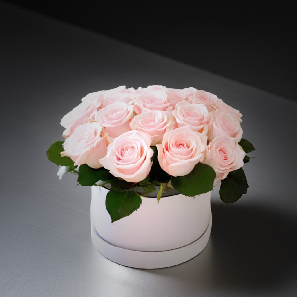 15 Pink Roses Elegantly Presented in A Sleek Paper Box - A charming arrangement of delicate pink roses, carefully selected for their beauty and freshness, elegantly presented in a sleek white paper box. This thoughtfully designed bouquet adds a touch of grace and sophistication, making it the perfect gift for any occasion, whether it’s a birthday, anniversary, romantic gesture, or a simple expression of appreciation. With its timeless appeal and elegant white box presentation, this floral gift is sure to leave a lasting impression.